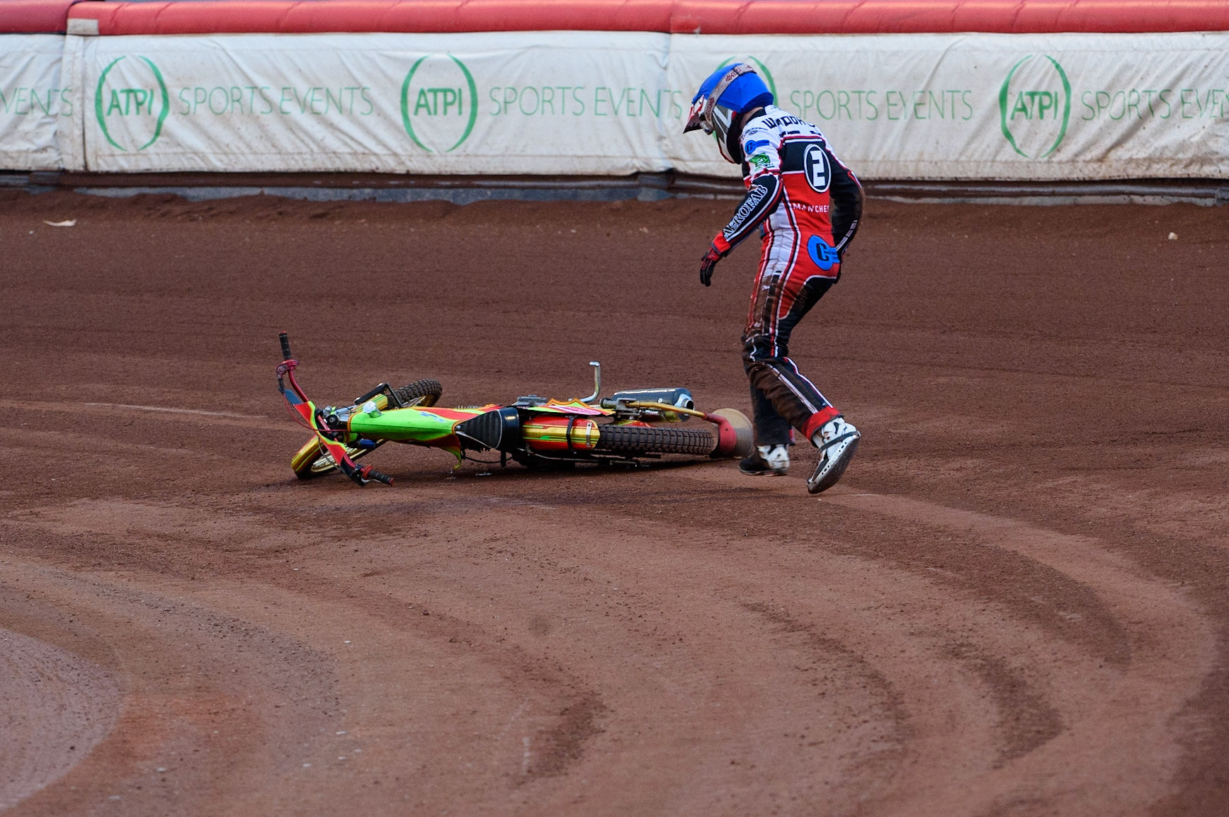 MANCHESTER, UK. MAY 28TH  After parting company with his machine, Ben Woodhull runs to move his bike to avoid a race stoppage during the SGB National Development League match between Belle Vue Colts and Berwick Bullets at the National Speedway Stadium, Manchester on Friday 28th May 2021. (Credit: Ian Charles | MI News)