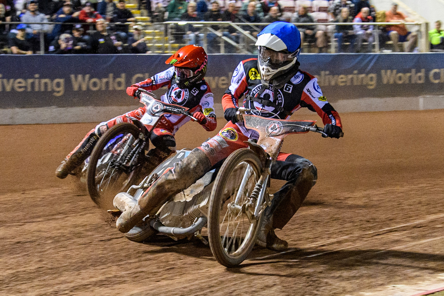 Belle Vue Aces' Antti Vuolas  in Blue leading Sheffield Tigers' Guest Rider Chris Harris  in Red during the Rowe Motor Oil Premiership Play Off Semi Final 2, 1st Leg match between Belle Vue Aces and Sheffield Tigers at the National Speedway Stadium, Manchester on Monday 16th September 2024. (Photo: Ian Charles | MI News)