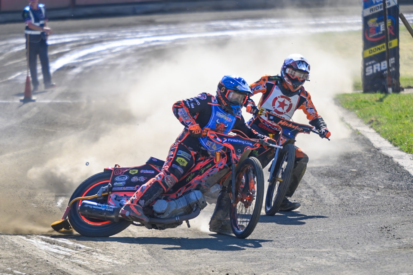 Alex Spooner guest rider for Buxton Bulls  in Blue rides outside Mickie Simpson of Stoke Potters in White during the National Development League Challenge match between Buxton Bulls and Stoke Potters at Hi-Edge Speedway, Buxton on Sunday 24th May 2026. (Photo: Ian Charles | MI News)