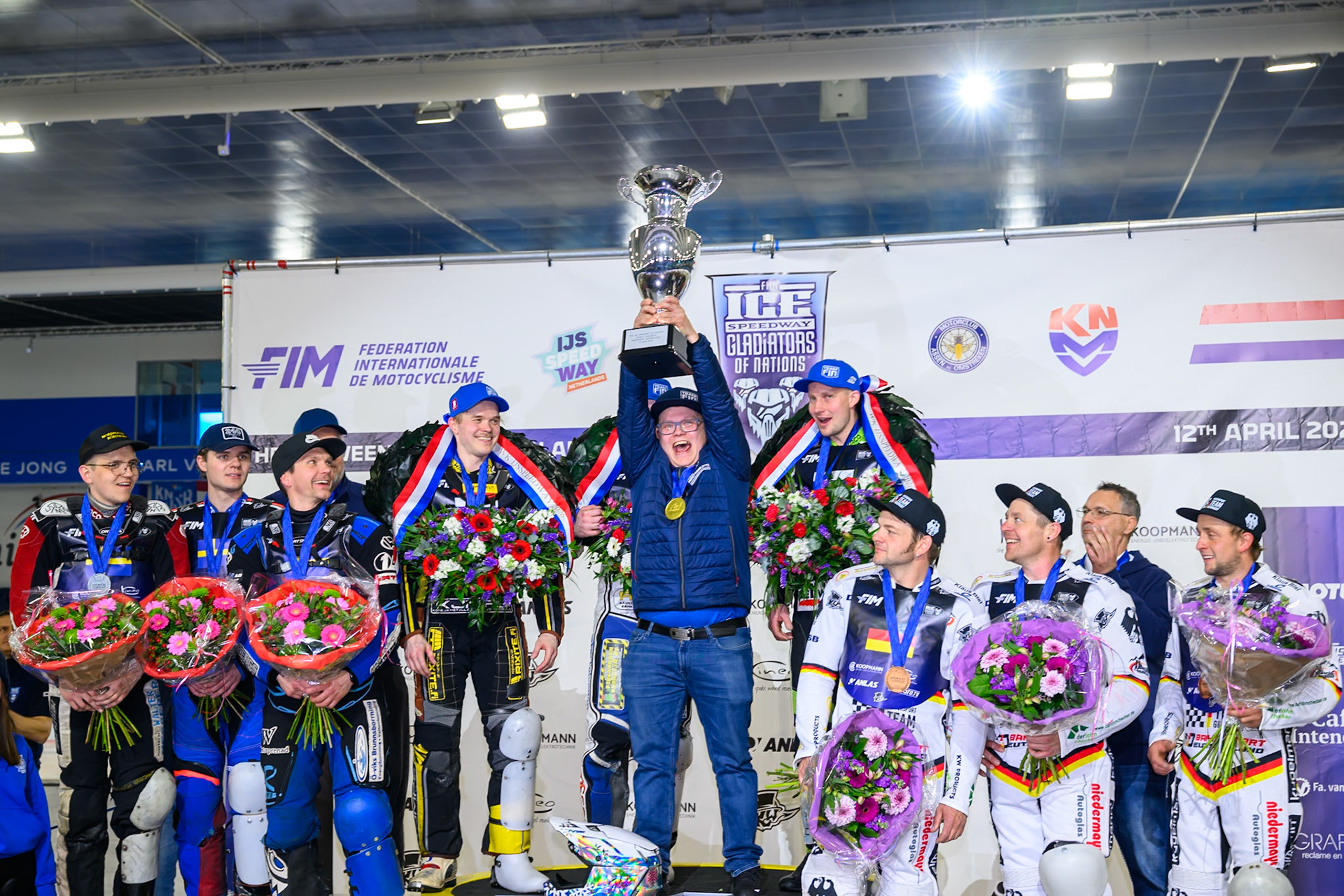 Aki-Pekka Mustonen, Team Manager of Finland  proudly raises the trophy during the FIM Ice Speedway Of Nations at Ice Rink Thialf, Heerenveen on Sunday 12th April 2026. (Photo: Ian Charles | MI News)