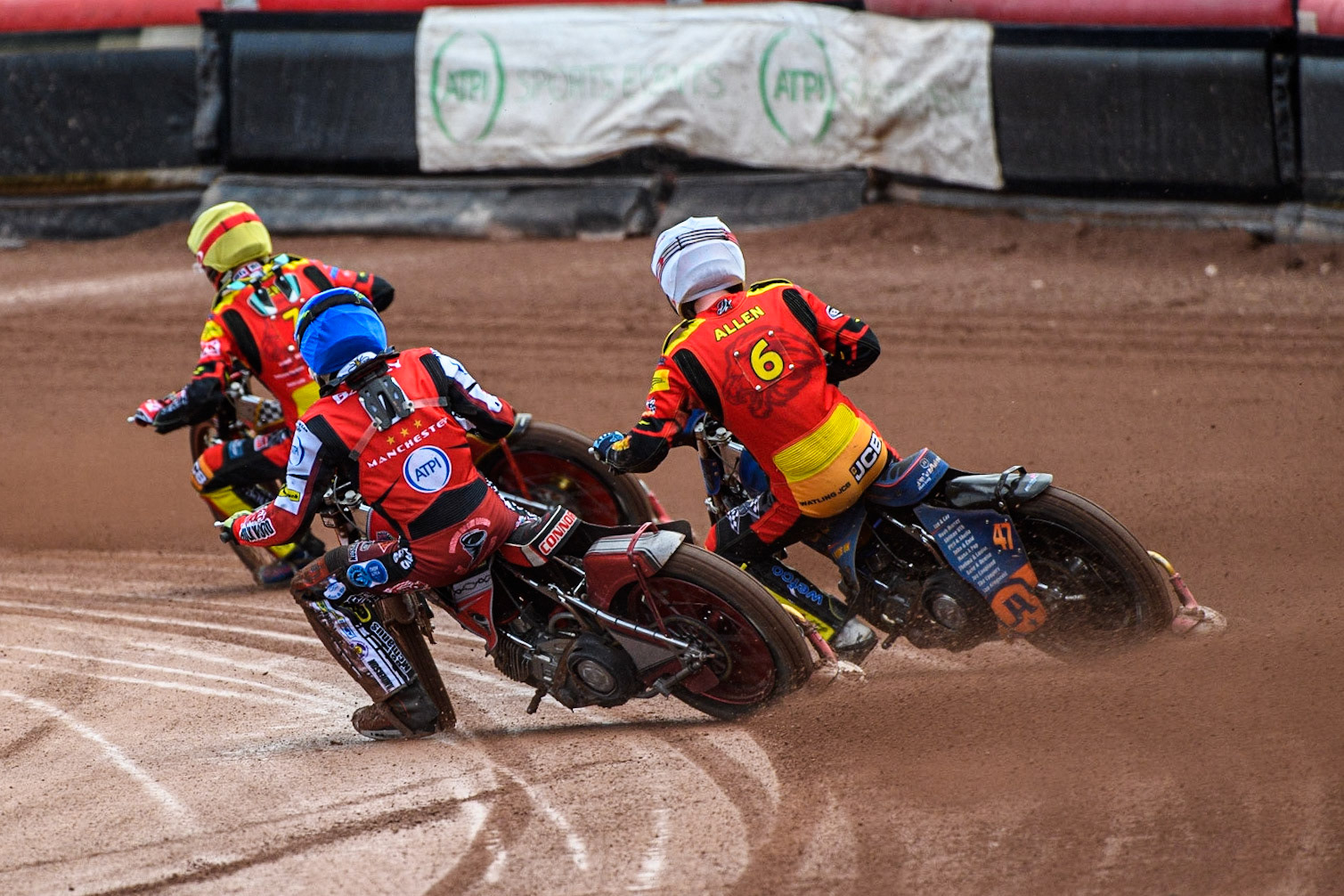 Norick Blodorn (Blue) chases Jake Allen (White) and Drew Kemp (Yellow) during the Sports Insure Premiership match between Belle Vue Aces and Leicester Lions at the National Speedway Stadium, Manchester on Monday 28th August 2023. (Photo: Ian Charles | MI News)