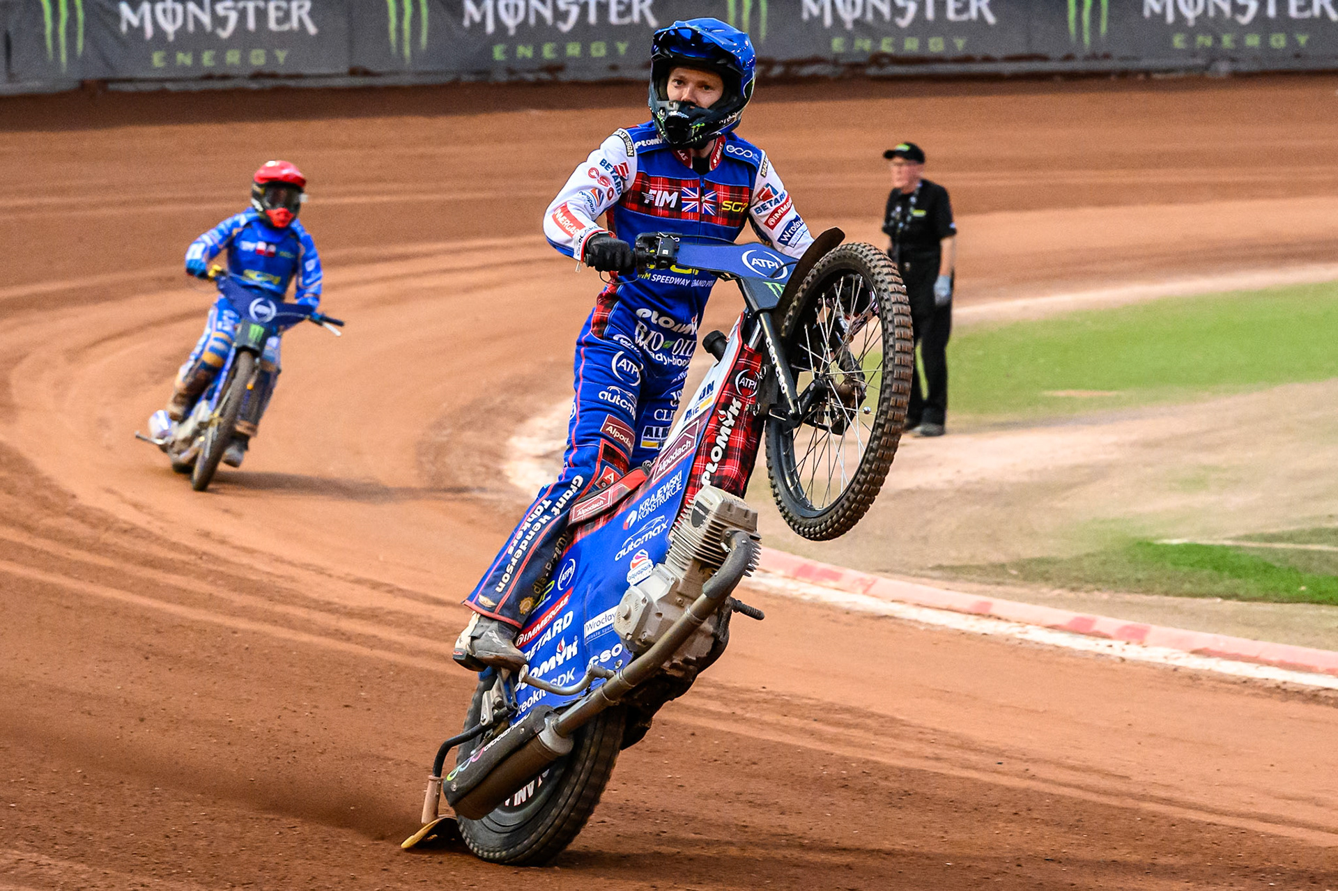 Dan Bewley (99) of Great Britain celebrates with a wheelie during the ATPI FIM Speedway Grand Prix Round 4 at the National Speedway Stadium, Manchester, on Friday 13th June 2025. (Photo: Ian Charles | MI News)