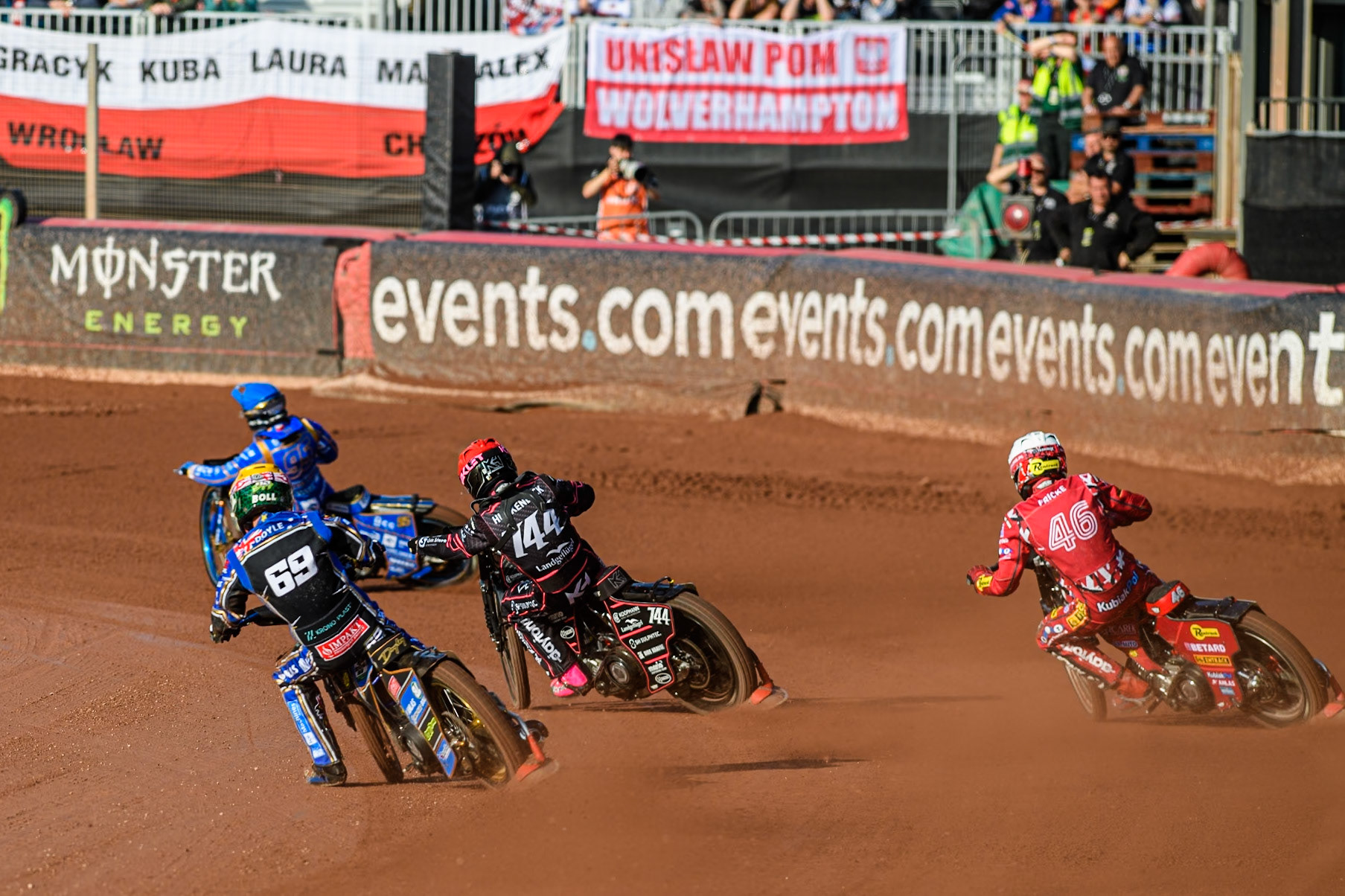 Jason Doyle (69) of Australia in Yellow chases Kai Huckenbeck (744) of Germany in Red, Max Fricke (46) of Australia in White and Bartosz Zmarzlik (95) of Poland in Blue during the ATPI FIM Speedway Grand Prix Round 5 at the National Speedway Stadium, Manchester, on Saturday 14th June 2025. (Photo: Ian Charles | MI News)