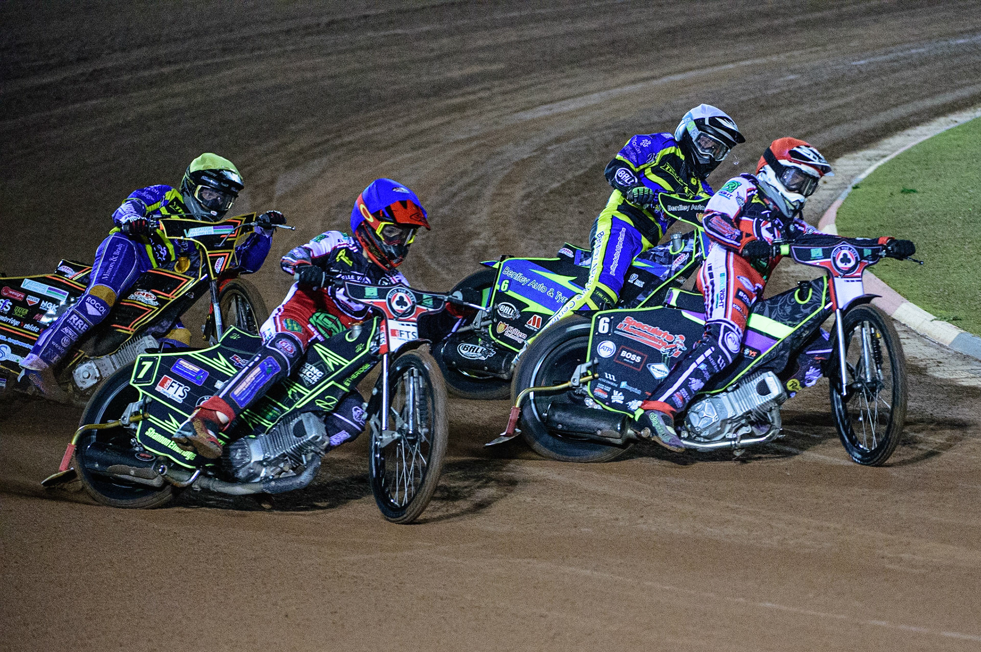MANCHESTER, UK. OCT 7TH  Jye Etheridge   (Blue) and Tom Brennan  (Red) lead Danyon Hume (White) and Connor Mountain  (Yellow) during the SGB Premiership Play off Semi-Final Second Leg between Belle Vue Aces and Sheffield Tigers at the National Speedway Stadium, Manchester on Thursday 7th October 2021. (Credit: Ian Charles | MI News)
