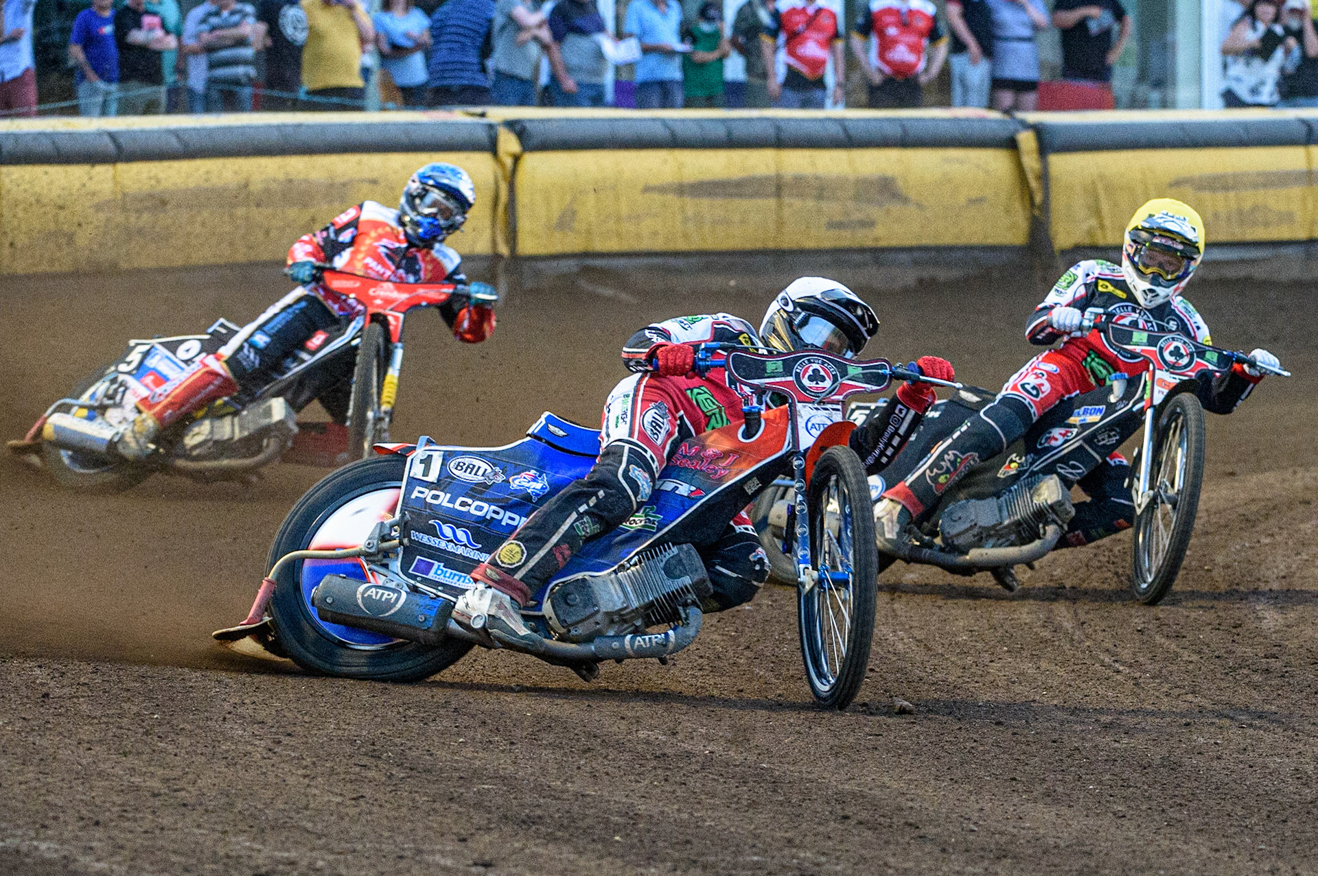 PETERBOROUGH, UK. JULY 19TH Brady Kurtz (White) and Dan Bewley (Yellow) go for maximum points ahead of Bjarne Pedersen  (Blue)  during the SGB Premiership match between Peterborough and Belle Vue Aces at East of England Showground, Peterborough on Monday 19th July 2021. (Credit: Ian Charles | MI News)