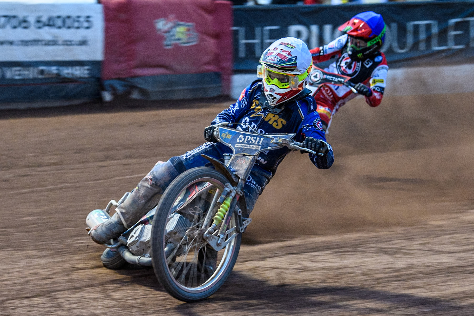 King Lynn Stars' Michael Palm Toft in White leading Belle Vue Aces' Dan Bewley in Blue during the Rowe Motor Oil Premiership match between Belle Vue Aces and King's Lynn Stars at the National Speedway Stadium, Manchester on Monday 20th May 2024. (Photo: Ian Charles | MI News)