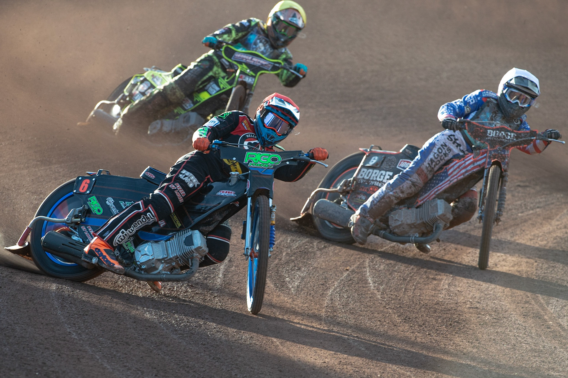 Photo by Ian Charles

Dimitri Berge  (Red) leads Luke Becker  (White) and Jye Etheridge  (Yellow)

Belle Vue Aces v Poole Pirates, British Speedway Premiership, Belle Vue National Speedway Stadium, Manchester, Monday 1  July  2019
