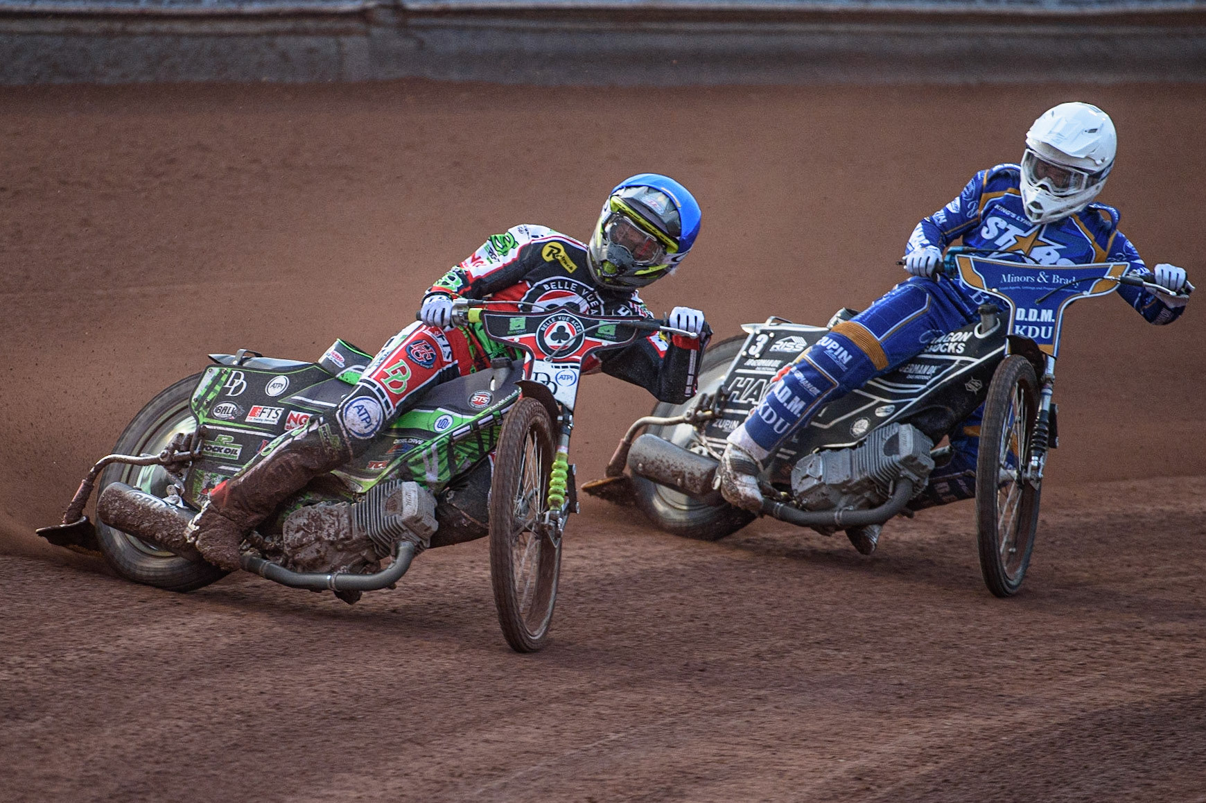 MANCHESTER, UK. AUGUST 23RD    Charles Wright  (Blue) leads Erik Riss  (White) during the SGB Premiership match between Belle Vue Aces and King's Lynn Stars at the National Speedway Stadium, Manchester on Monday 23rd August 2021. (Credit: Ian Charles | MI News)