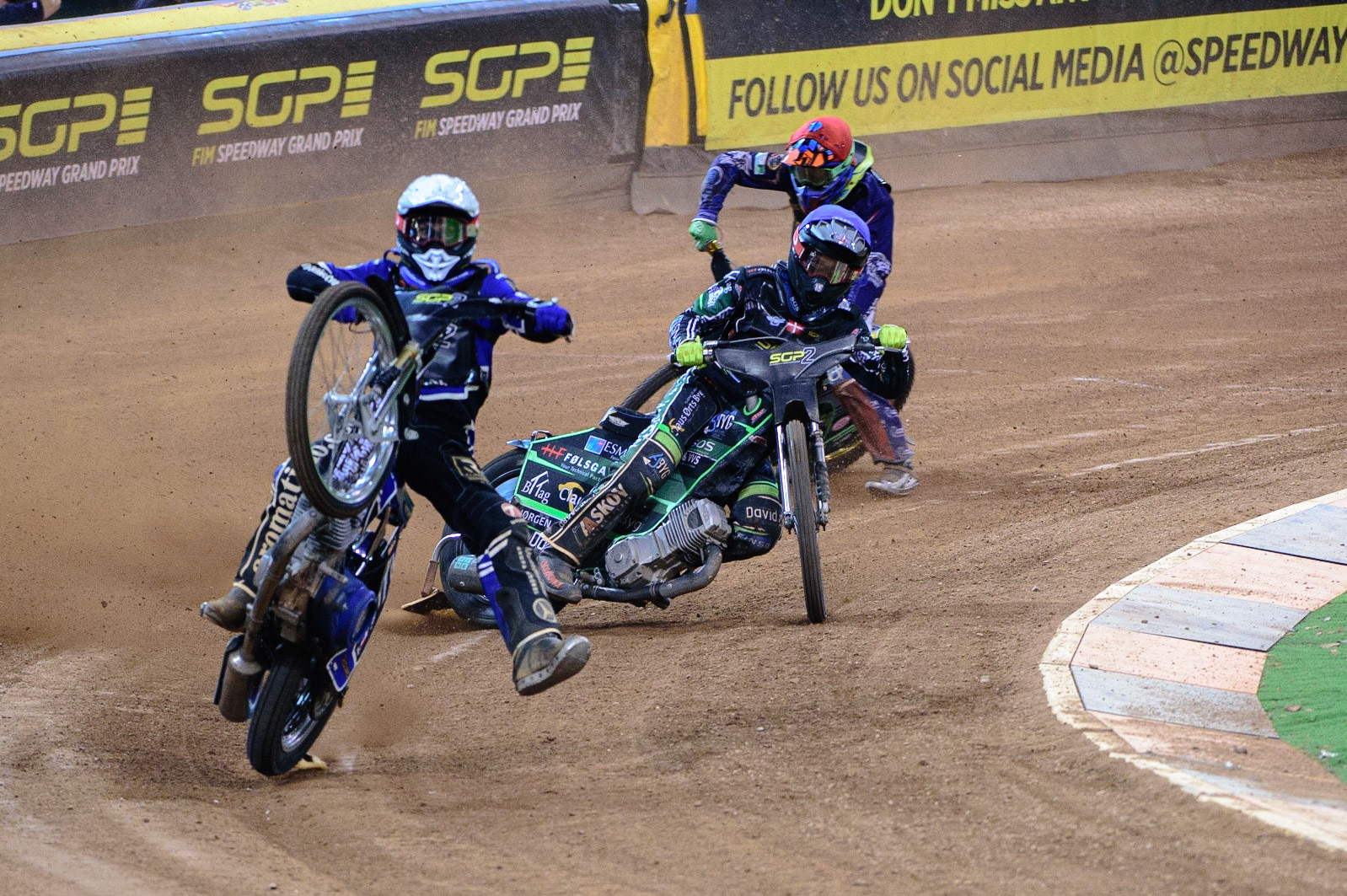 Jakub Miskowiak (Poland) (White) rears uncontrollably with Jonas Knudsen (Denmark)  (Blue) and Daniel Klima (Czech Republic) (Red) behind during the FIM  Speedway Grand Prix  2 of Great Britain at the Principality Stadium, Cardiff on Sunday 14th August 2022. (Credit: Ian Charles | MI News)