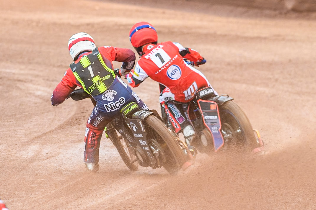 Ipswich Witches' Emil Sayfutdinov in White chases Belle Vue Aces' Brady Kurtz in Red during the Rowe Motor Oil Premiership match between Belle Vue Aces and Ipswich Witches at the National Speedway Stadium, Manchester on Monday 22nd April 2024. (Photo: Ian Charles | MI News)