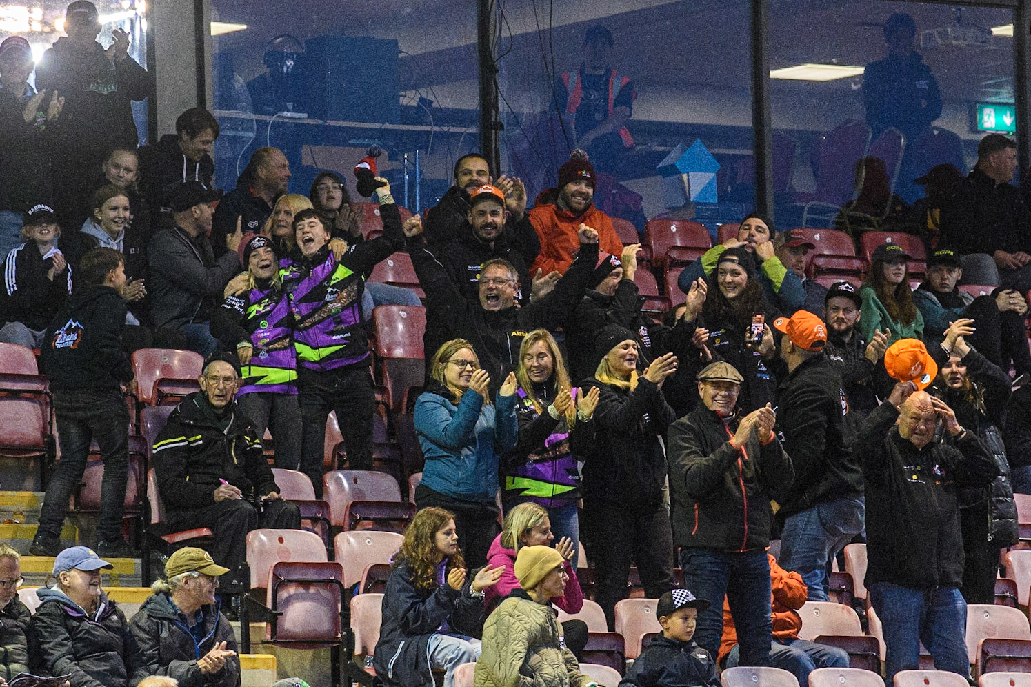 German fans celebrate Markus Jell’s win in the Last Chance Heat during the FIM World Flat Track Championship Round 1 at the National Speedway Stadium, Manchester on Saturday 5th August 2023. (Photo: Ian Charles | MI News)