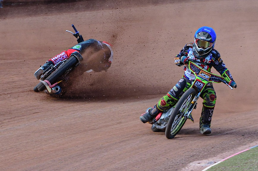 MANCHESTER, UK. JUN 3RD Charlie Wood (33) (Red) crashes behind William Cairns (145)  (Blue) during the British Youth Speedway Championship (Round 4)  at the National Speedway Stadium, Manchester on Friday 3rd June 2022. (Credit: Ian Charles | MI News)