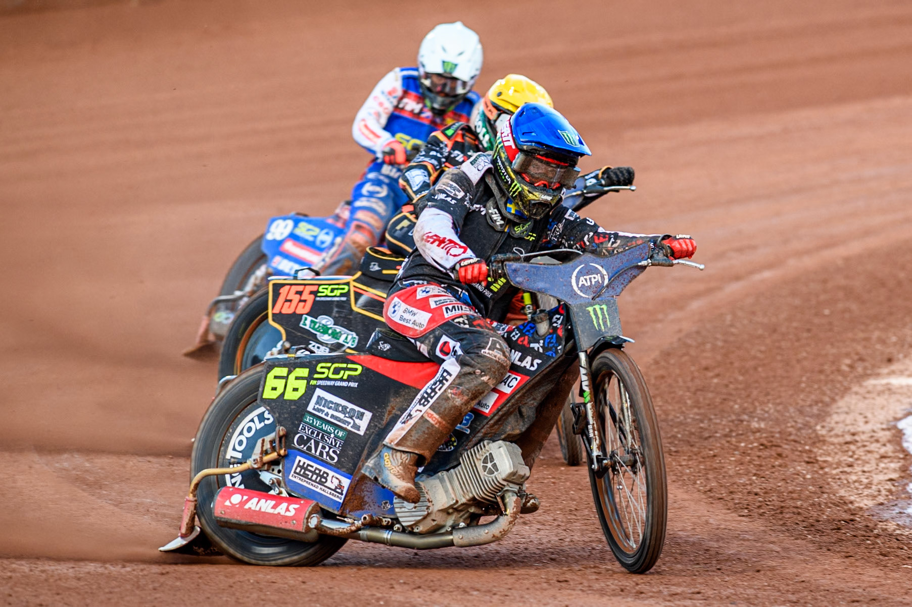 Fredrik Lindgren (66) of Sweden in Blue leading Mikkel Michelsen (155) of Denmark in Yellow and Dan Bewley (99) of Great Britain in White during the ATPI FIM Speedway Grand Prix Round 5 at the National Speedway Stadium, Manchester, on Saturday 14th June 2025. (Photo: Ian Charles | MI News)
