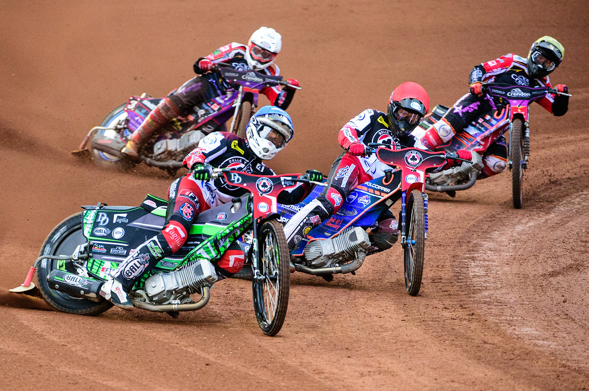 Charles Wright (Blue) leads team mate Brady Kurtz (Red) lead Scott Nicholls  (Yellow) and Ulrich Oostergaard  (White) during the SGB Premiership match between Belle Vue Aces and Peterborough at the National Speedway Stadium, Manchester on Monday 25th July 2022. (Credit: Ian Charles | MI News