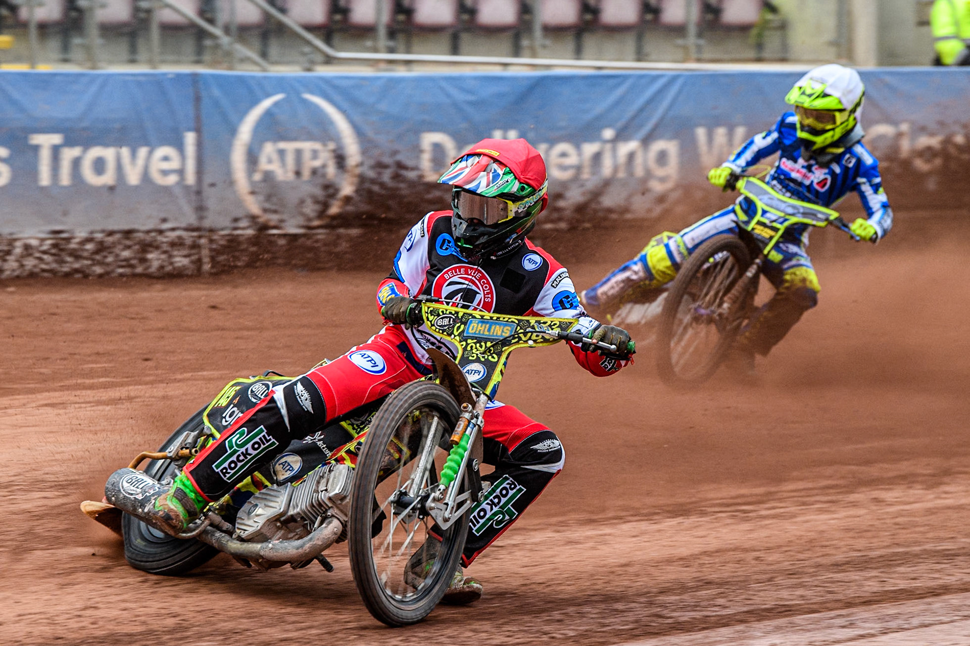 Belle Vue Colts' William Cairns  in Red leading Oxford Chargers' Jacob Clouting  in White during the WSRA National Development League match between Belle Vue Colts and Oxford Chargers at the National Speedway Stadium, Manchester on Friday 2nd August 2024. (Photo: Ian Charles | MI News)