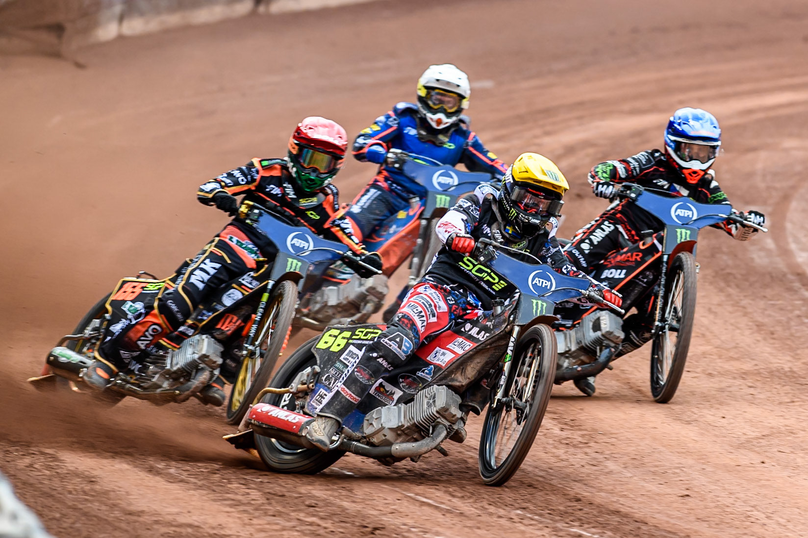 Fredrik Lindgren (66) of Sweden in Yellow leading Mikkel Michelsen (155) of Denmark in Red, January Kvech (201) of Czech Republic in Blue and Andzejs Lebedevs (29) of Latvia in White during the ATPI FIM Speedway Grand Prix Round 4 at the National Speedway Stadium, Manchester, on Friday 13th June 2025. (Photo: Ian Charles | MI News)