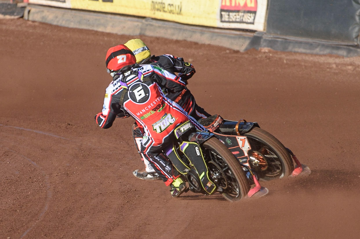 MANCHESTER, UK. JULY 15TH   Tom Brennan  (Red) chases Jack Smith (Yellow) during the SGB Premiership match between Belle Vue Aces and Wolverhampton Wolves at the National Speedway Stadium, Manchester on Thursday 15th July 2021. (Credit: Ian Charles | MI News)