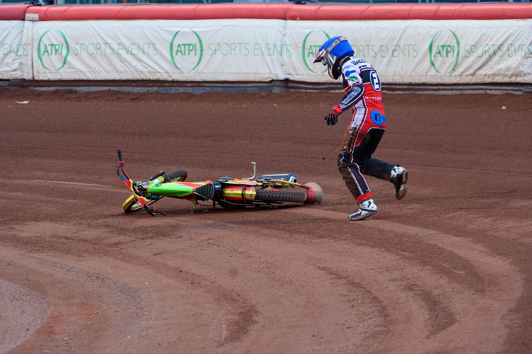 MANCHESTER, UK. MAY 28TH  After parting company with his machine, Ben Woodhull runs to move his bike to avoid a race stoppage during the SGB National Development League match between Belle Vue Colts and Berwick Bullets at the National Speedway Stadium, Manchester on Friday 28th May 2021. (Credit: Ian Charles | MI News)