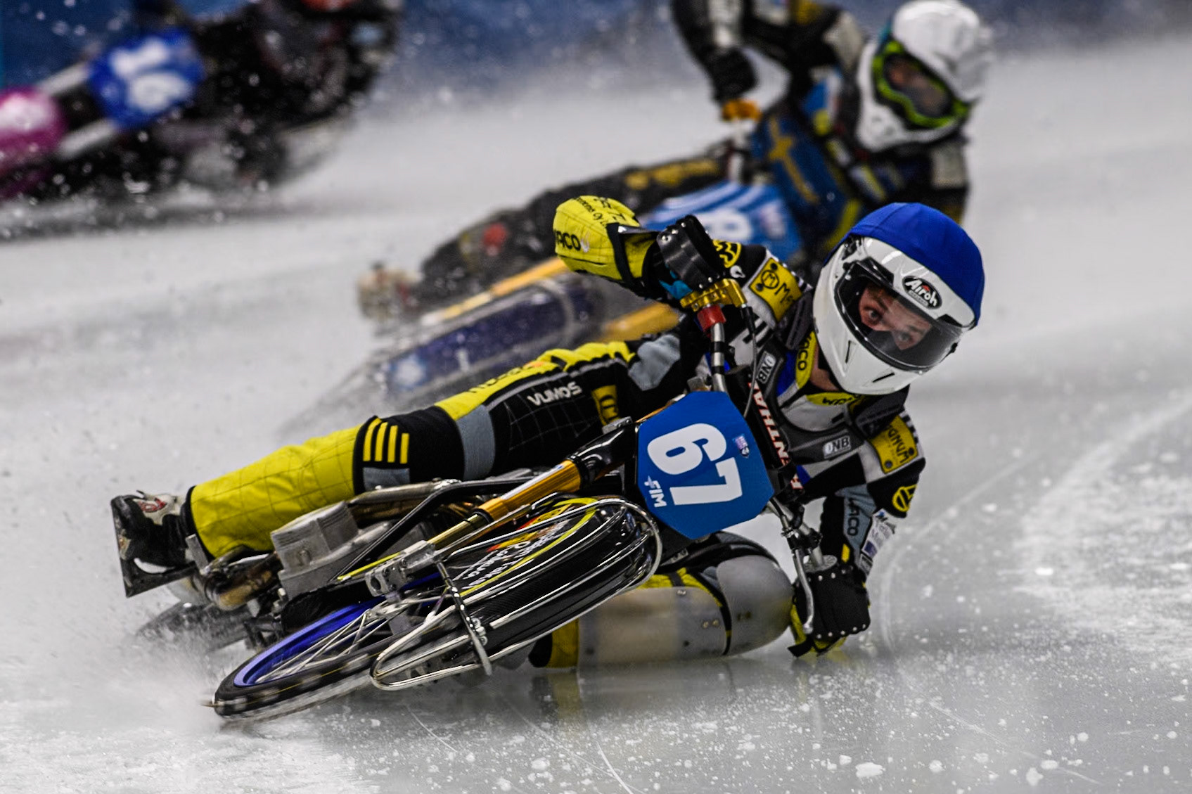 Finland's Heikki Huusko (67) (Blue) leads  Sweden"s Jimmy Olsén (81) (White) during the FIM Ice Speedway Gladiators World Championship Final 1 at the Max-Aicher-Arena, Inzell on Saturday 23 March 2024. (Photo: Ian Charles | MI News)