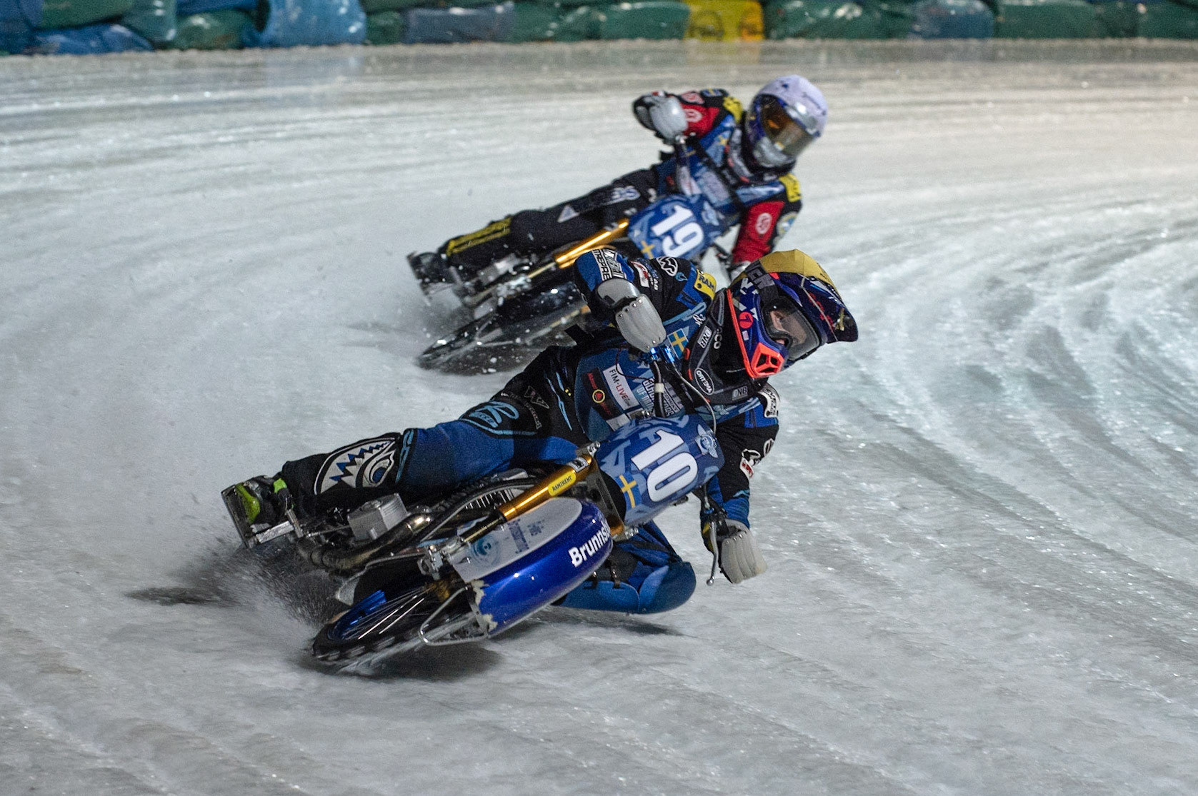 BERLIN GERMANY  - February 29 Niclas Svensson (Yellow) leads his father and team mate Stefan Svensson (White)   during theIce Speedway of Nations (Day 1) at the Horst-Dohm-Eisstadion, Berlin,  on Saturday 29 February 2020. (Credit: Ian Charles | MI News)