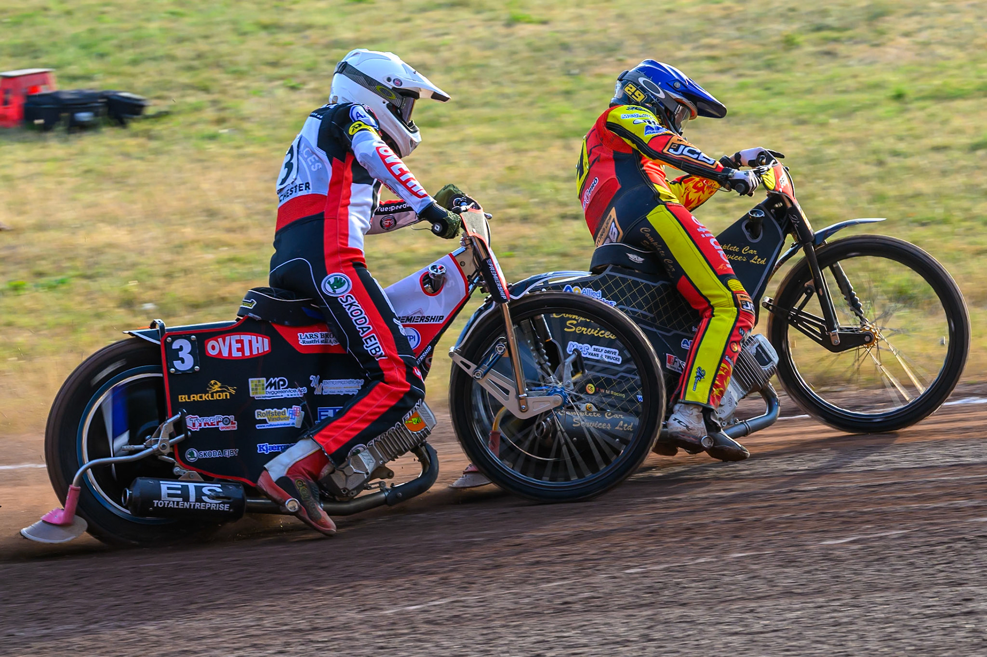 Peter Kildemand of Belle Vue Aces in White chases Kyle Howarth of Leicester Lions  in Blue during the Rowe Motor Oil Premiership match between Leicester Lions and Belle Vue Aces at the Hydroscan Arena, Leicester on Thursday 23rd July 2026. (Photo: Ian Charles | MI News)