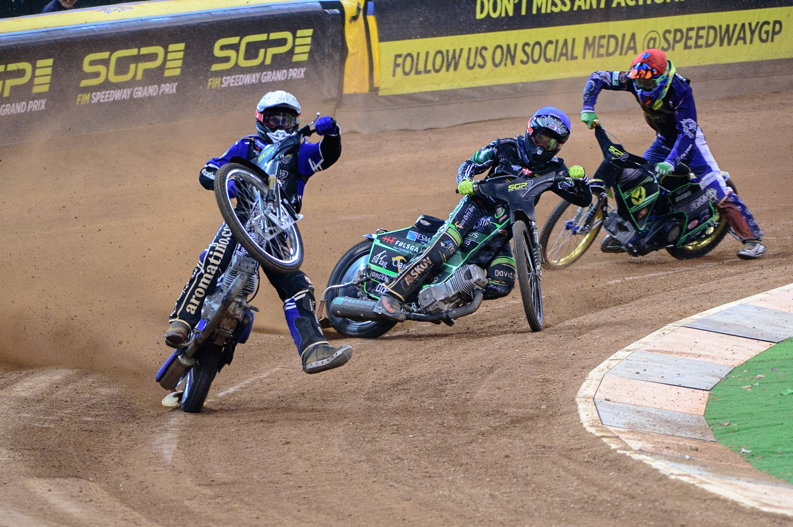 Jakub Miskowiak (Poland) (White) rears uncontrollably with Jonas Knudsen (Denmark)  (Blue) and Daniel Klima (Czech Republic) (Red) behind during the FIM  Speedway Grand Prix  2 of Great Britain at the Principality Stadium, Cardiff on Sunday 14th August 2022. (Credit: Ian Charles | MI News)