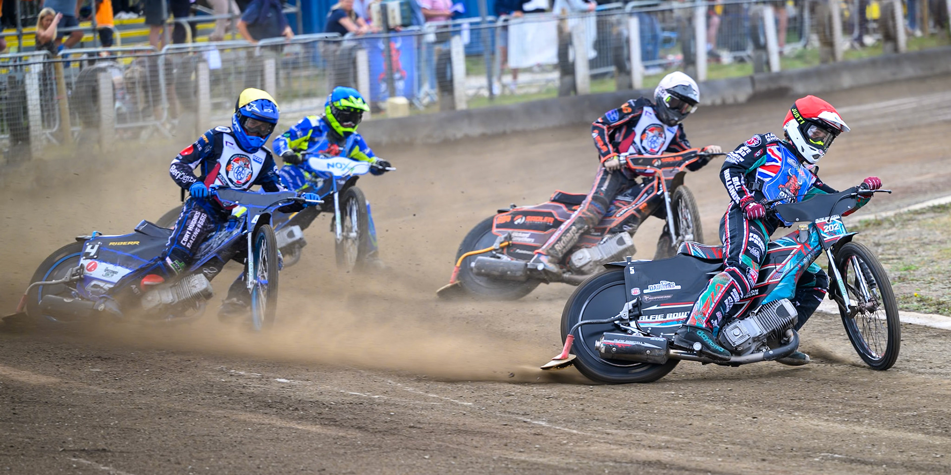 Alfie Bowtell of Buxton Bulls in Red leading Charlie Southwick of Middlesborough Tigers in Yellow, Harry Sadler of Middlesborough Tigers in White  and Will Boraston of Buxton Bulls in Blue during the WSRA National Development League match  between Buxton Bulls and Middlesborough Tigers at Hi-Edge Speedway, Buxton on Sunday 16th August 2026. (Photo: Ian Charles | MI News)