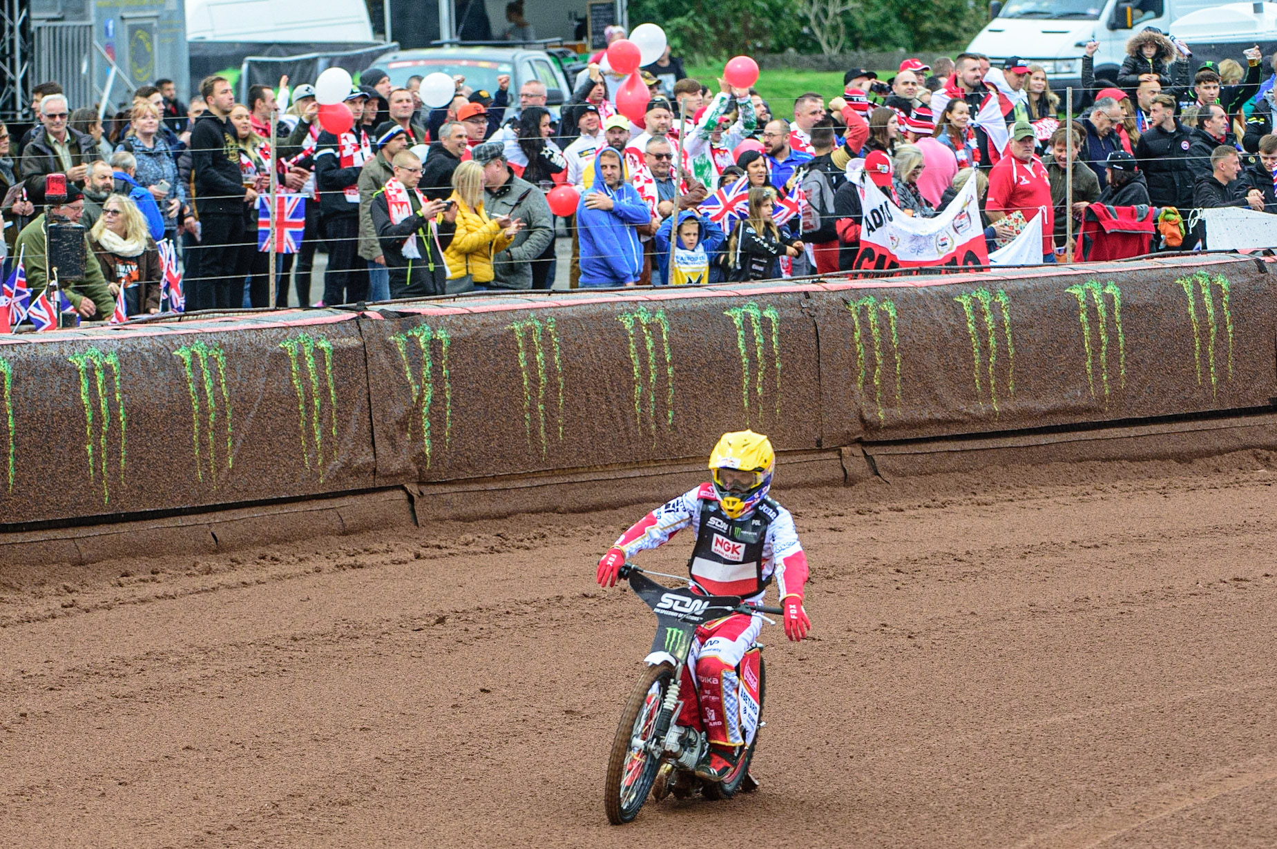 MANCHESTER, UK. OCT 17TH Polish Fans cheer Maciej Janowski as he makes his way to the start during the Monster Energy FIM Speedway of Nations at the National Speedway Stadium, Manchester on Sunday  17th October 2021. (Credit: Ian Charles | MI News)