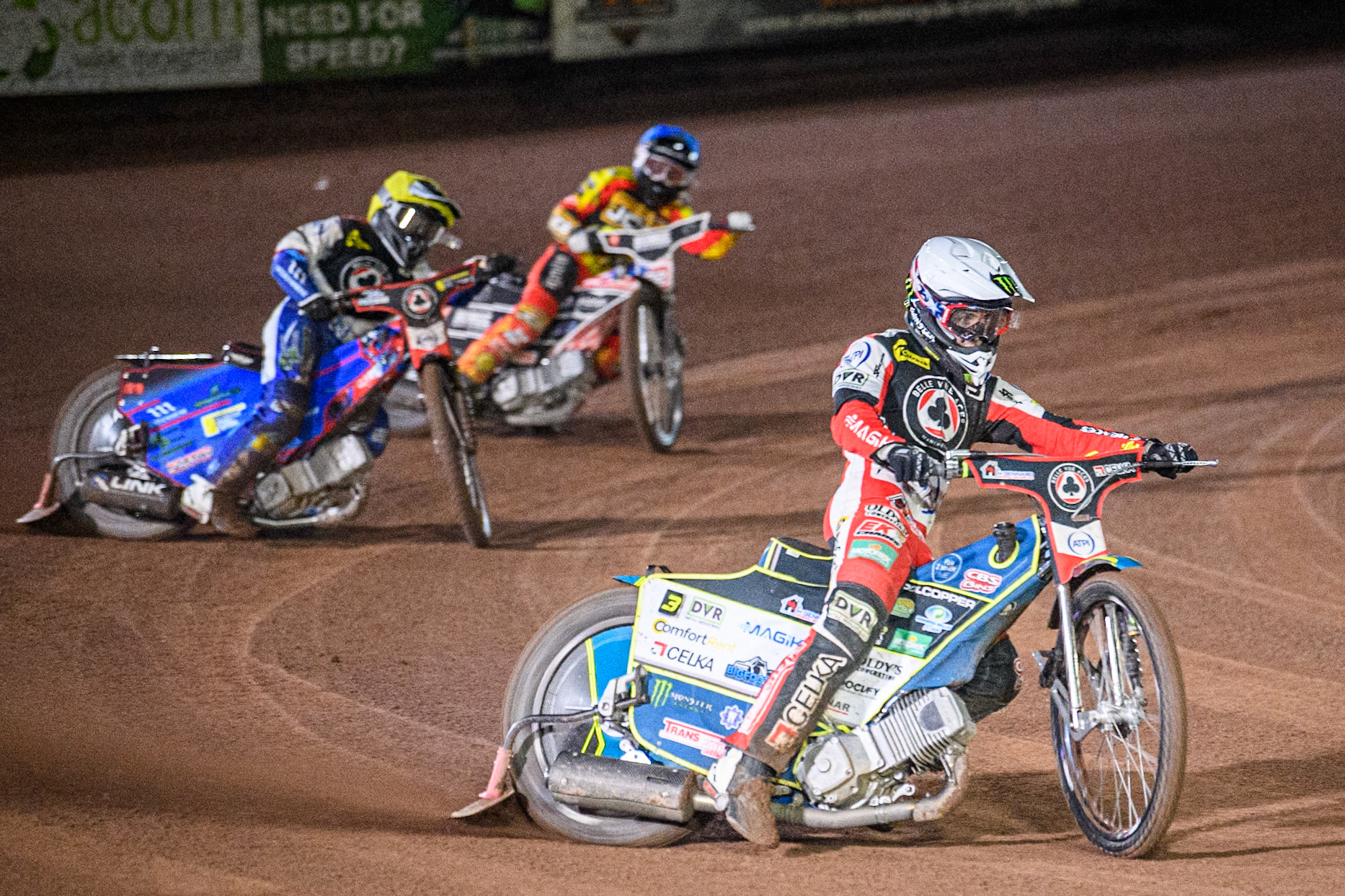 Belle Vue Aces' Jaimon Lidsey in White leading Belle Vue Aces' Ben Cook in Yellow and Leicester Lions' Luke Becker in Blue during the Rowe Motor Oil Premiership Grand Final 2nd Leg between Leicester Lions and Belle Vue Aces at the Pidcock Motorcycles Arena, Leicester on Thursday 26th September 2024. (Photo: Ian Charles | MI News)