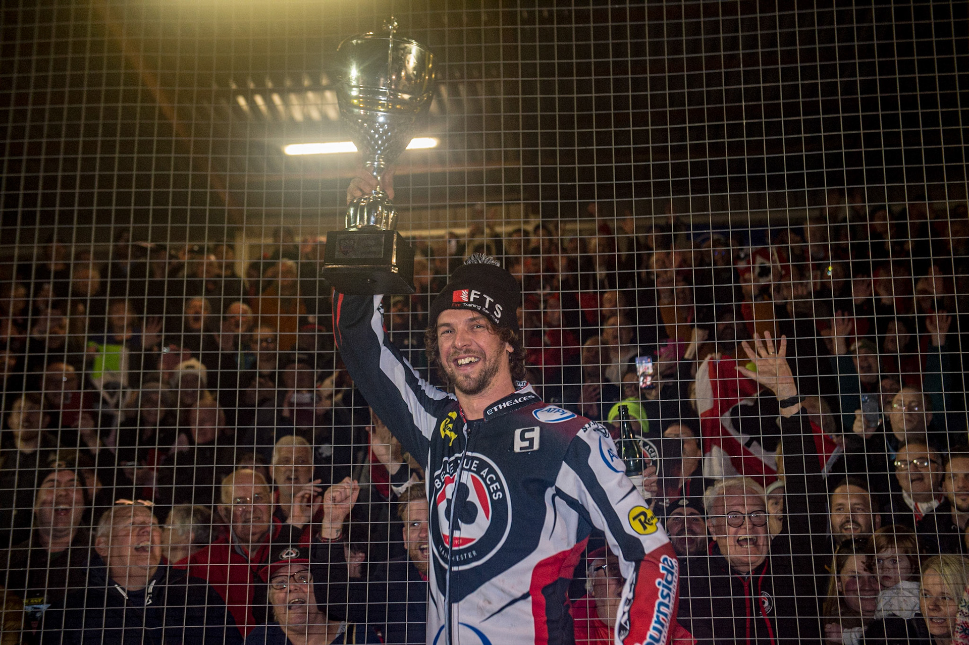Charles Wright with the trophy (he too changed into a race suit for the presentation) during the SGB Premiership Grand Final 2nd Leg between Sheffield Tigers and Belle Vue Aces at Owlerton Stadium, Sheffield on Thursday 13th October 2022. (Credit: Ian Charles | MI News)