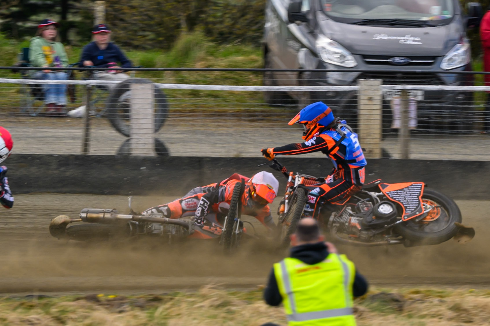 Connor Coles of NDL Nomads   in White fall and Jack Smith of Buxton Bulls   in Blue collides with him during the  Challenge match between Buxton Bulls and NDL Nomads at Hi-Edge Speedway, Buxton on Sunday 19th April 2026. (Photo: Ian Charles | MI News)