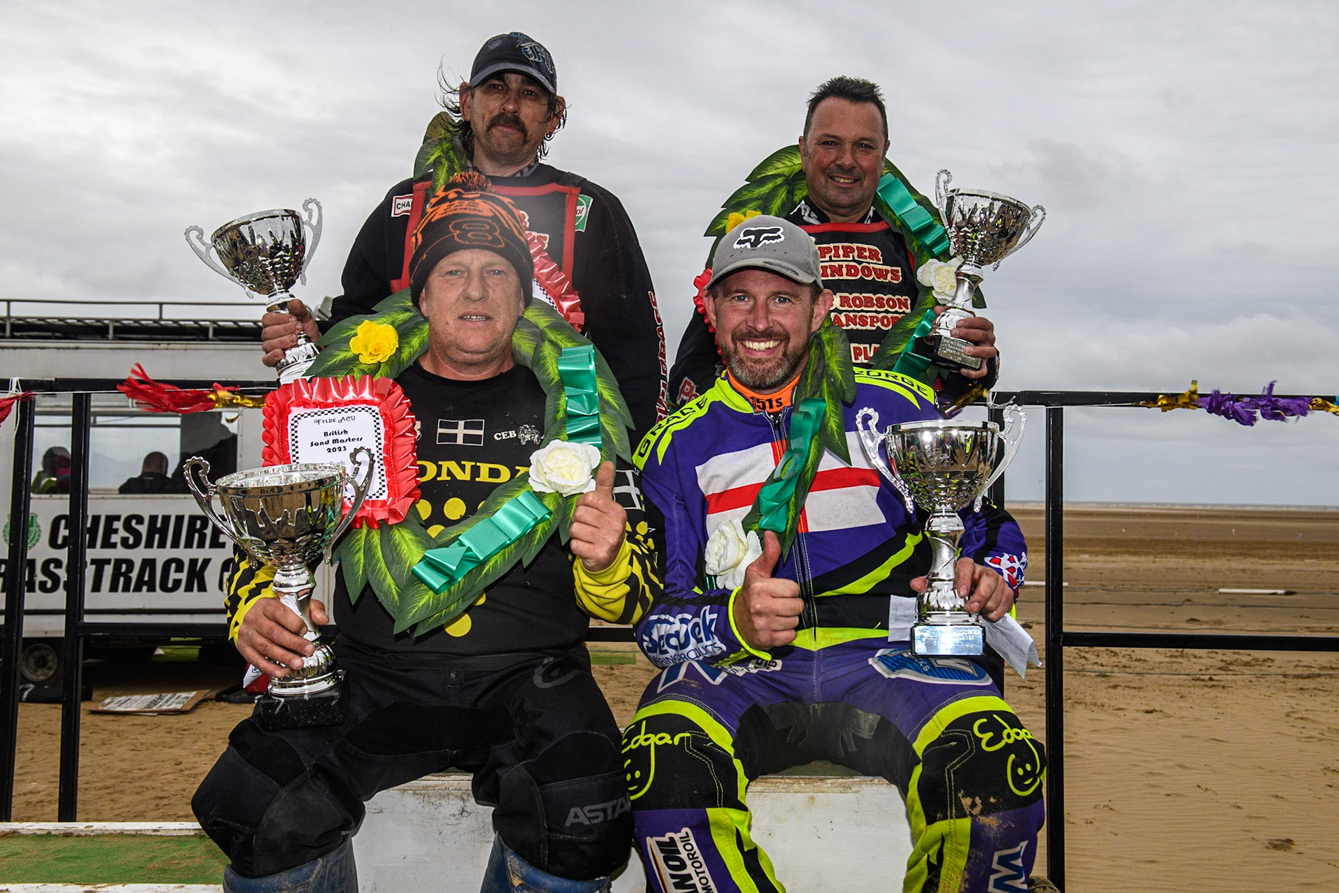 All the winners: Rear: Colin Blackbourn &amp; Carl Pugh (25), Front: Dan Bray (Quads)(240) (left) Paul Cooper (11) during the Fylde ACU British Sand Racing Masters Championship at  St Annes on Sea, Lancashire on Sunday 30th July 2023. (Photo: Ian Charles | MI News)