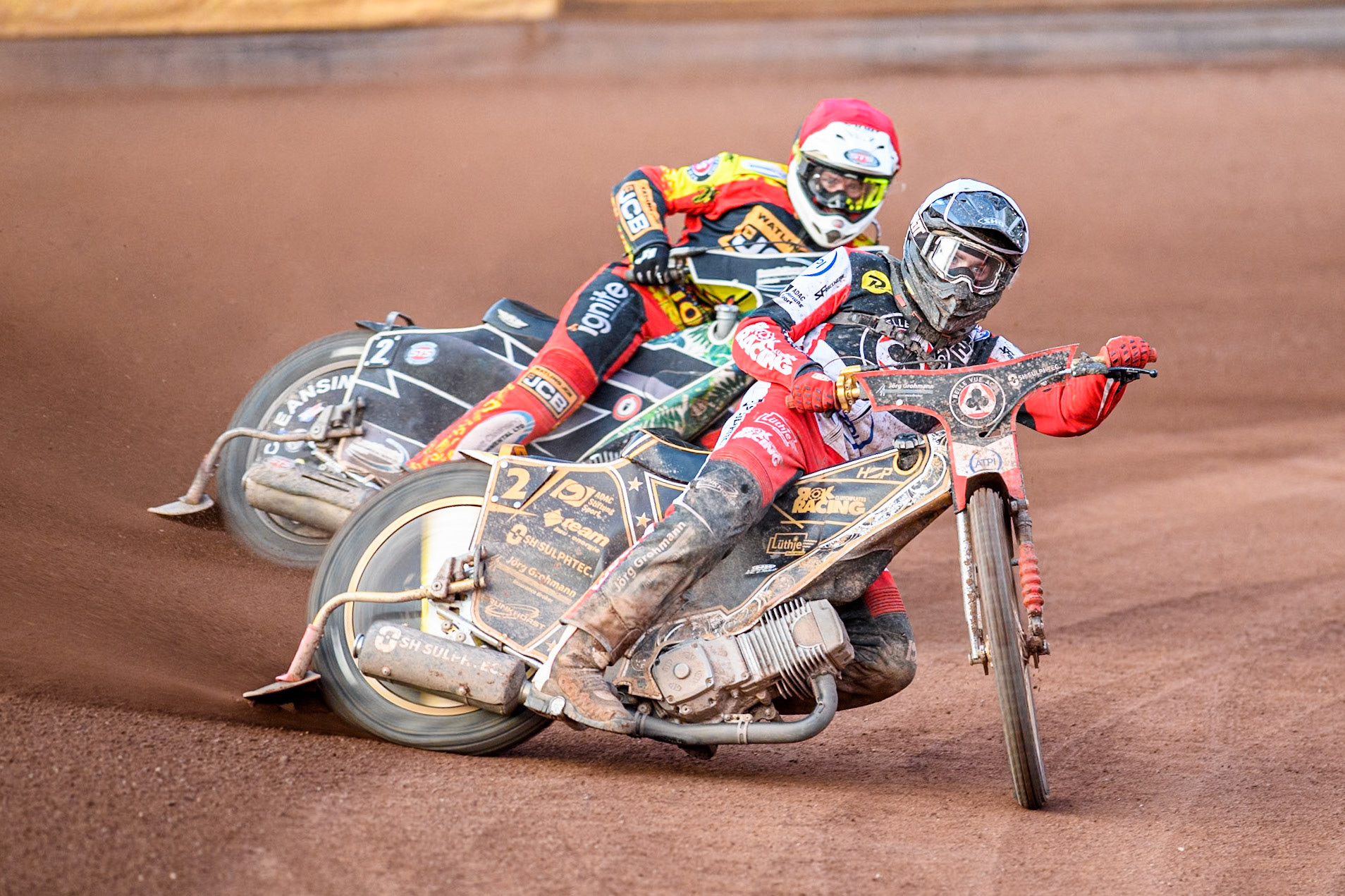 Belle Vue Aces' Norick Blodorn in White leading Leicester Lions' Richard Lawson in Red during the Rowe Motor Oil Premiership match between Leicester Lions and Belle Vue Aces at the Pidcock Motorcycles Arena, Leicester on Thursday 25th July 2024. (Photo: Ian Charles | MI News)
