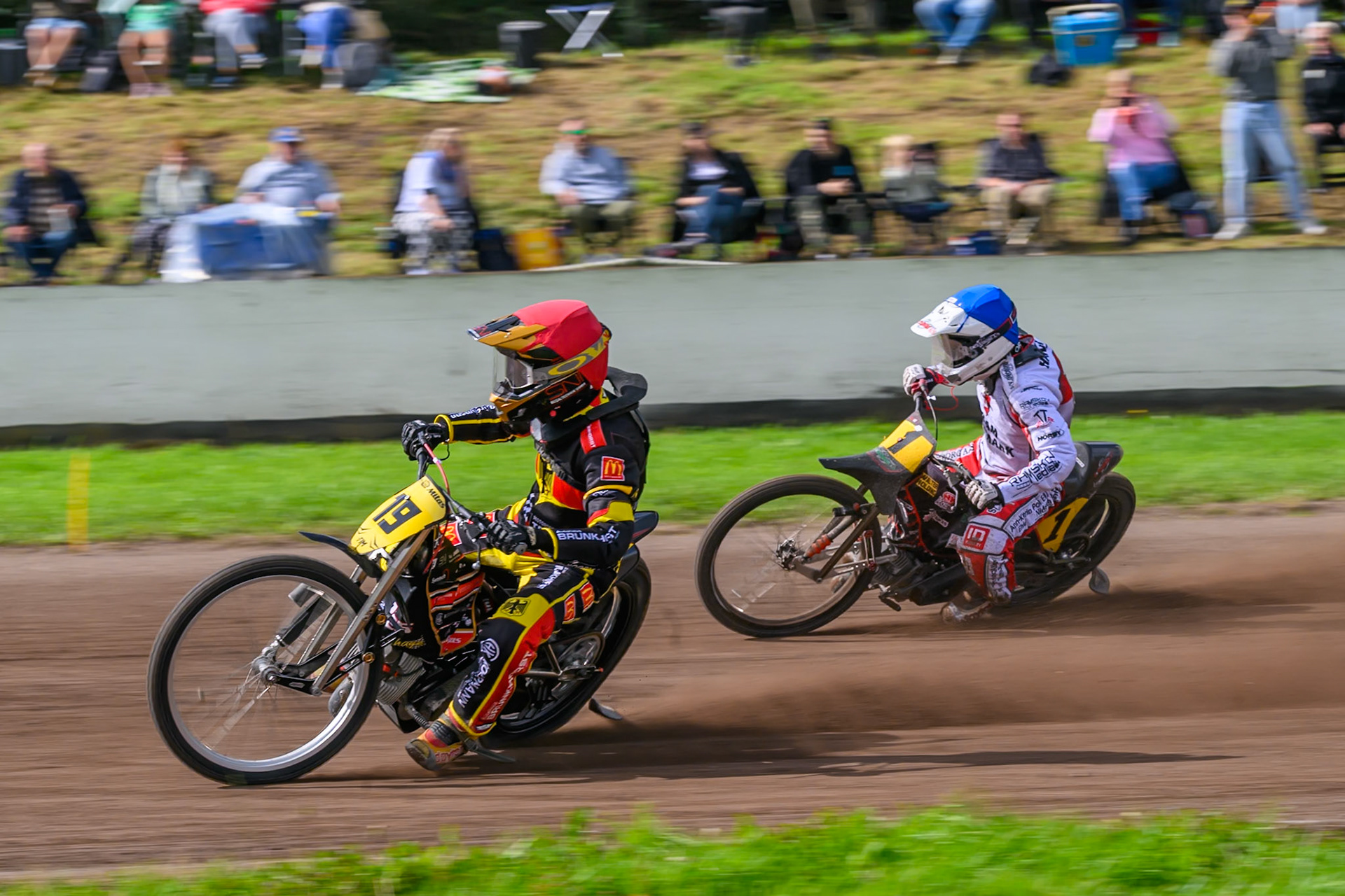 Lukas Fienhage (19) of Germany in Red leading Kenneth Kruse Hansen (1) of Denmark in Blue during the FIM Long Track of Nations 2026 at the Speed Centre Roden in the Netherlands on Sunday 20th September 2026. (Photo: Ian Charles | MI News)
