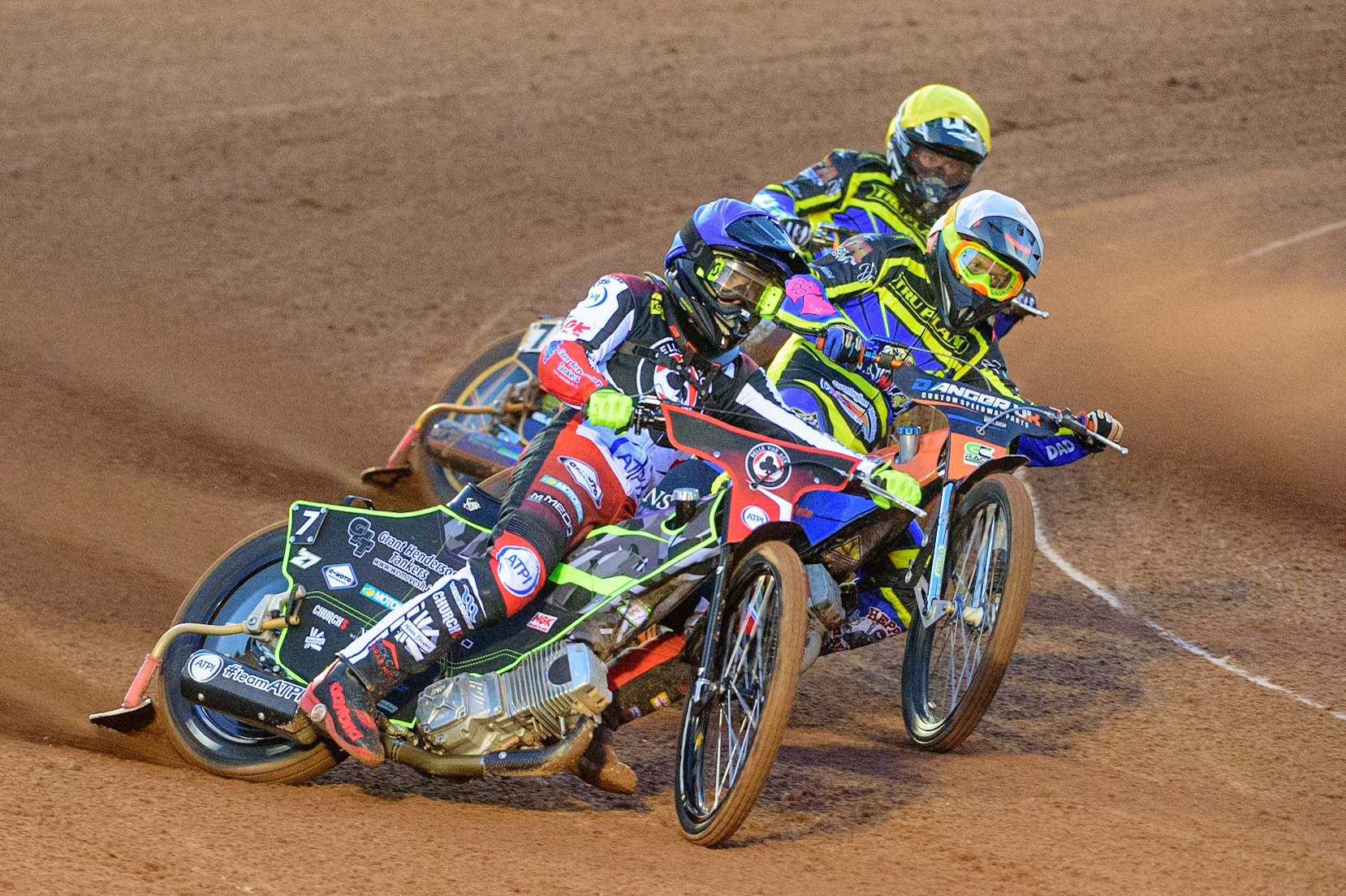 MANCHESTER, UK.  MAR 28TH.  Tom Brennan of Belle Vue leads Stefan Nielsen of Sheffield  (White) and Connor Mountain of Sheffield (Yellow) during the SGB Premiership League Cup match between Belle Vue Aces and Sheffield Tigers at the National Speedway Stadium, Manchester on Monday 28th March 2022. (Credit: Ian Charles | MI News)
