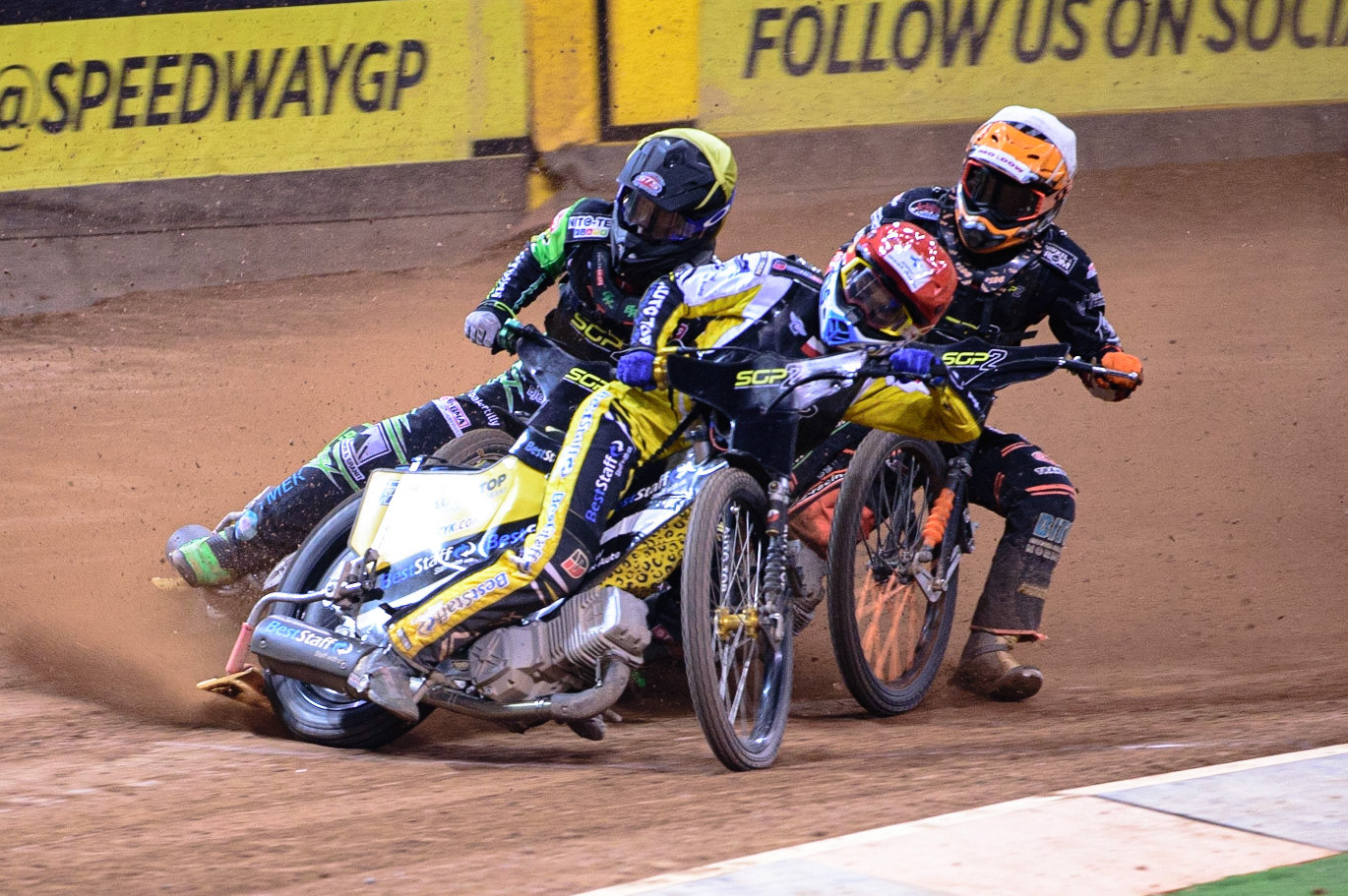 Wiktor Lampart (Poland) (Red) leads Benjamin Basso (Denmark)  (Yellow) and Kevin Juhl Pedersen (Denmark)  (White) during the FIM  Speedway Grand Prix  2 of Great Britain at the Principality Stadium, Cardiff on Sunday 14th August 2022. (Credit: Ian Charles | MI News)