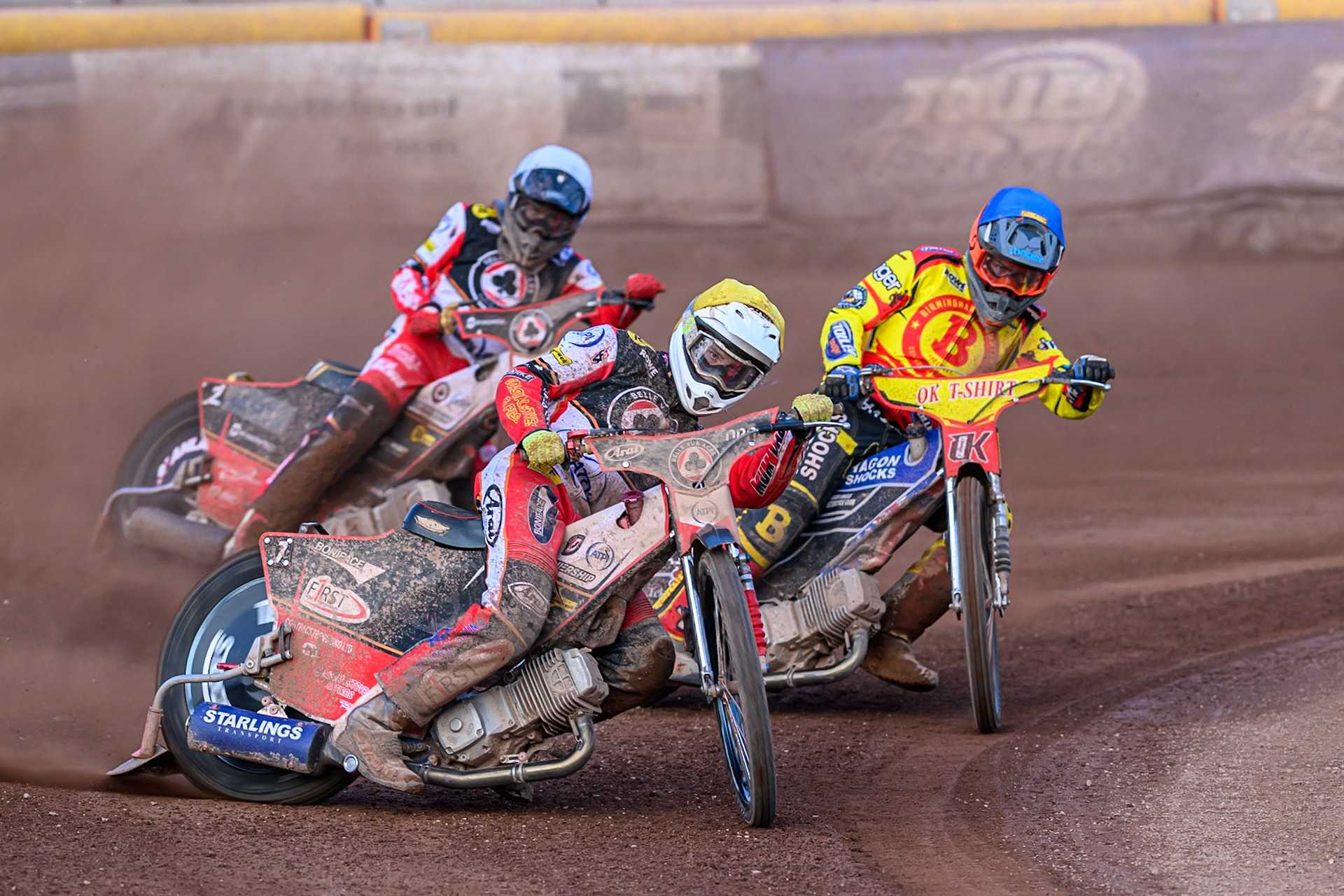 Belle Vue Aces' Jake Mulford in Yellow leading Birmingham Brummies' Jason Edwards in Blue and Belle Vue Aces' Norick Blodorn in White during the Rowe Motor Oil Premiership match between Birmingham Brummies and Belle Vue Aces at Perry Bar Stadium, Birmingham on Monday 2nd June 2025. (Photo: Ian Charles | MI News)