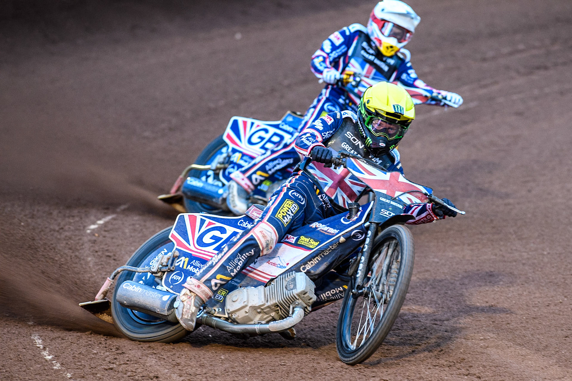 Dan Bewley of Great Britain in Yellow leading team mate Robert Lambert in White during the Monster Energy FIM Speedway of Nation Final at the National Speedway Stadium, Manchester on Saturday 13th July 2024. (Photo: Ian Charles | MI News)