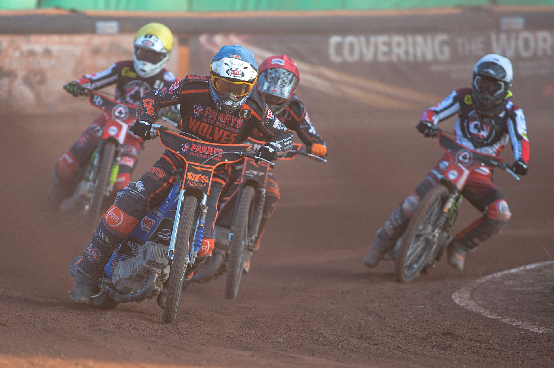WOLVERHAMPTON, UK. JUN 20TH Steve Worrall  (Blue) leads Sam Masters  (Red), Charles Wright  (Yellow) and Tom Brennan  (White) during the SGB Premiership match between Wolverhampton Wolves and Belle Vue Aces at Monmore Green Stadium, Wolverhampton on Monday 20th June 2022. (Credit: Ian Charles | MI News)