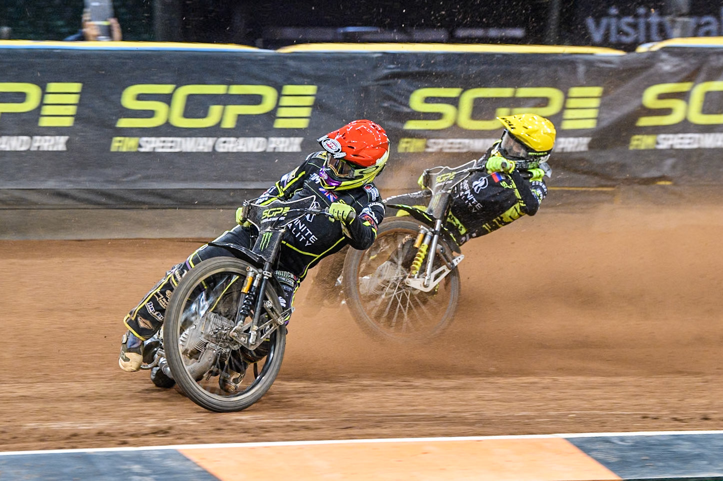 Tom Brennan (16) Wild card rider of Great Britain in Red leading Martin Vaculik (54) of Slovakia in Yellow during the FIM Speedway Grand Prix of Great Britain at The Principality Stadium, Cardiff on Saturday 17th August 2024. (Photo: Ian Charles | MI News)