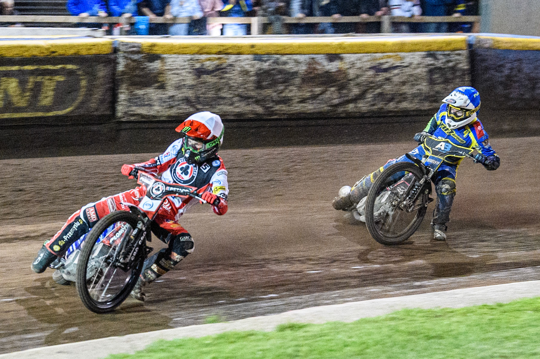 Belle Vue Aces' Dan Bewley in White leading Sheffield Tigers' Josh Pickering  in Blue during the Rowe Motor Oil Premiership Play Off Semi Final 2nd leg between Sheffield Tigers and Belle Vue Aces at Owlerton Stadium, Sheffield on Thursday 19th September 2024. (Photo: Ian Charles | MI News)
