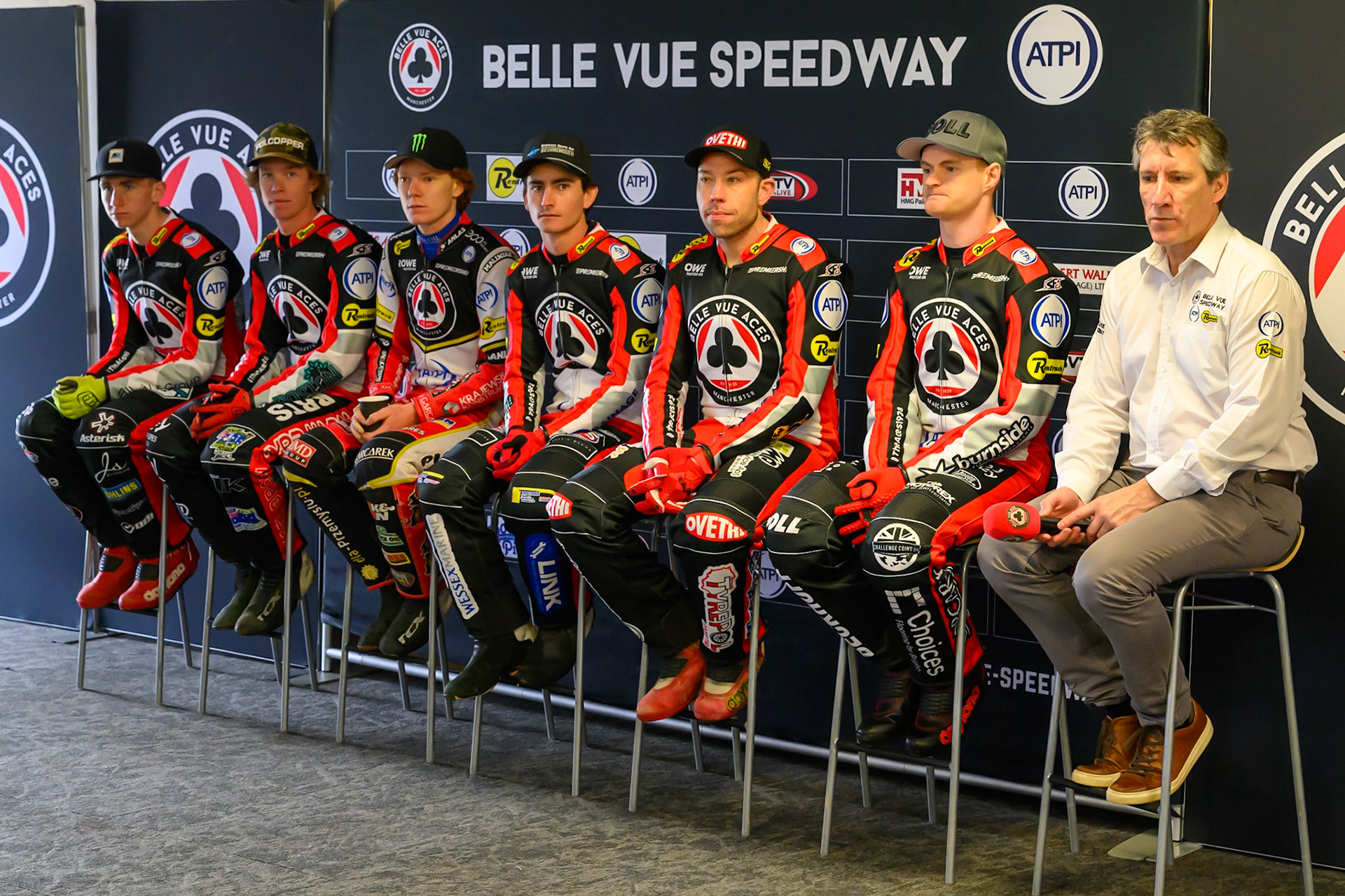The Belle Vue Aces face the press and fans (L to R) Will Cairns, Tate Zischke, Dan Bewley, Zach Cook, Peter Kildemand, Brady Kurtz, Mark Lemon (Team Manager) during the Belle Vue Aces Media Day at the National Speedway Stadium, Manchester on Wednesday 11th March 2026. (Photo: Ian Charles | MI News)
