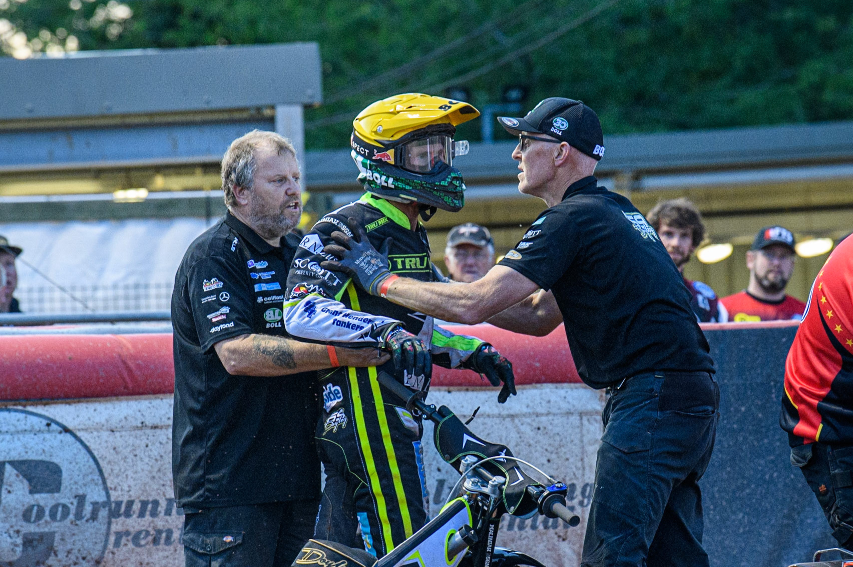 Jason Doyle is held back by his mechanics following an on track incident which upset him during the Sports Insure Premiership match between Belle Vue Aces and Ipswich Witches at the National Speedway Stadium, Manchester on Monday 17th July 2023. (Photo: Ian Charles | MI News)
