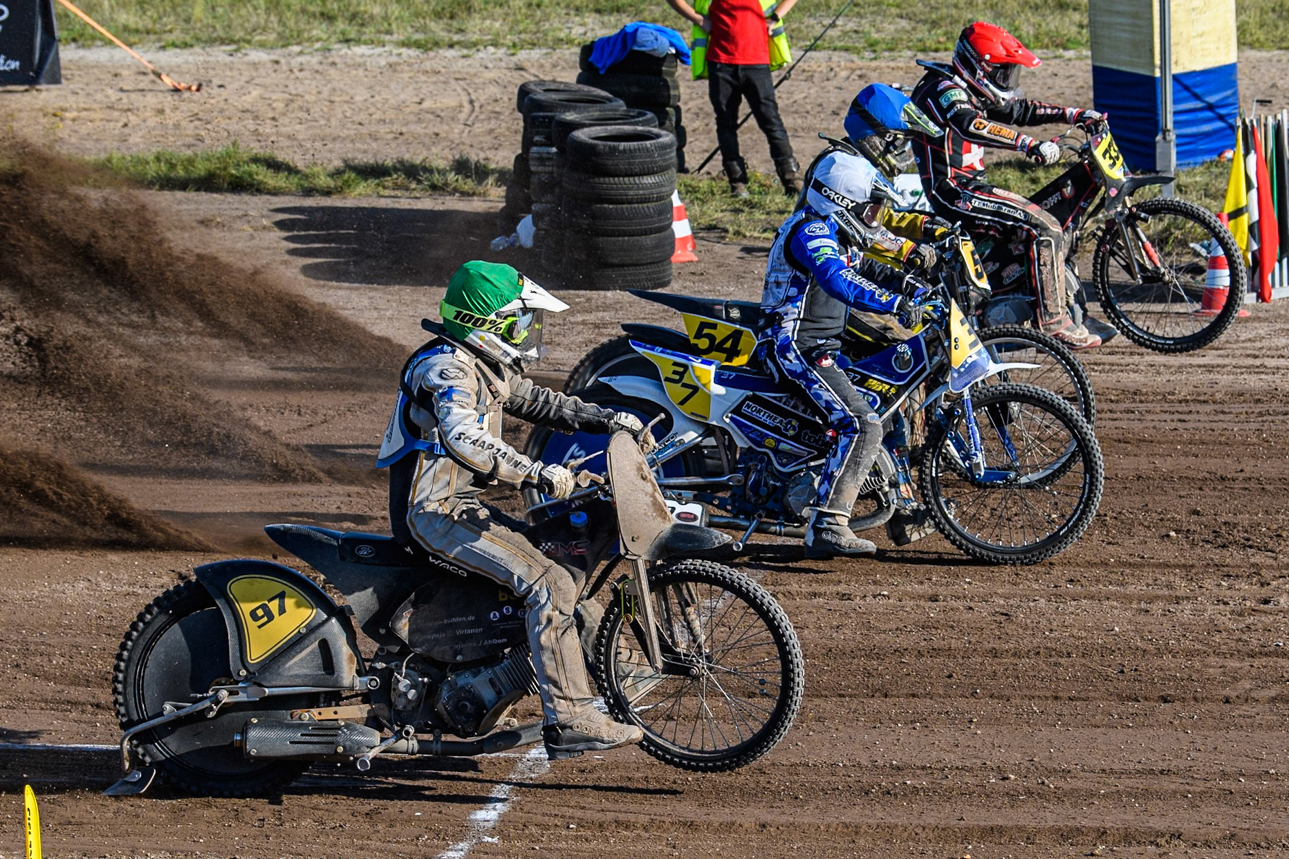 Re of the Last Chance Heat: (L to R) Henri Ahlbom (97) of Finland in Green , Chris Harris (37)of Great Britain in White, Mika Meijer (54) of The Netherlands in Blue and Kenneth Kruse Hansen (333) of Denmark in Red during the FIM Long Track World Championship Final 5 at the Speed Centre Roden, Roden, Netherlands on Sunday 22nd September 2024. (Photo: Ian Charles | MI News)