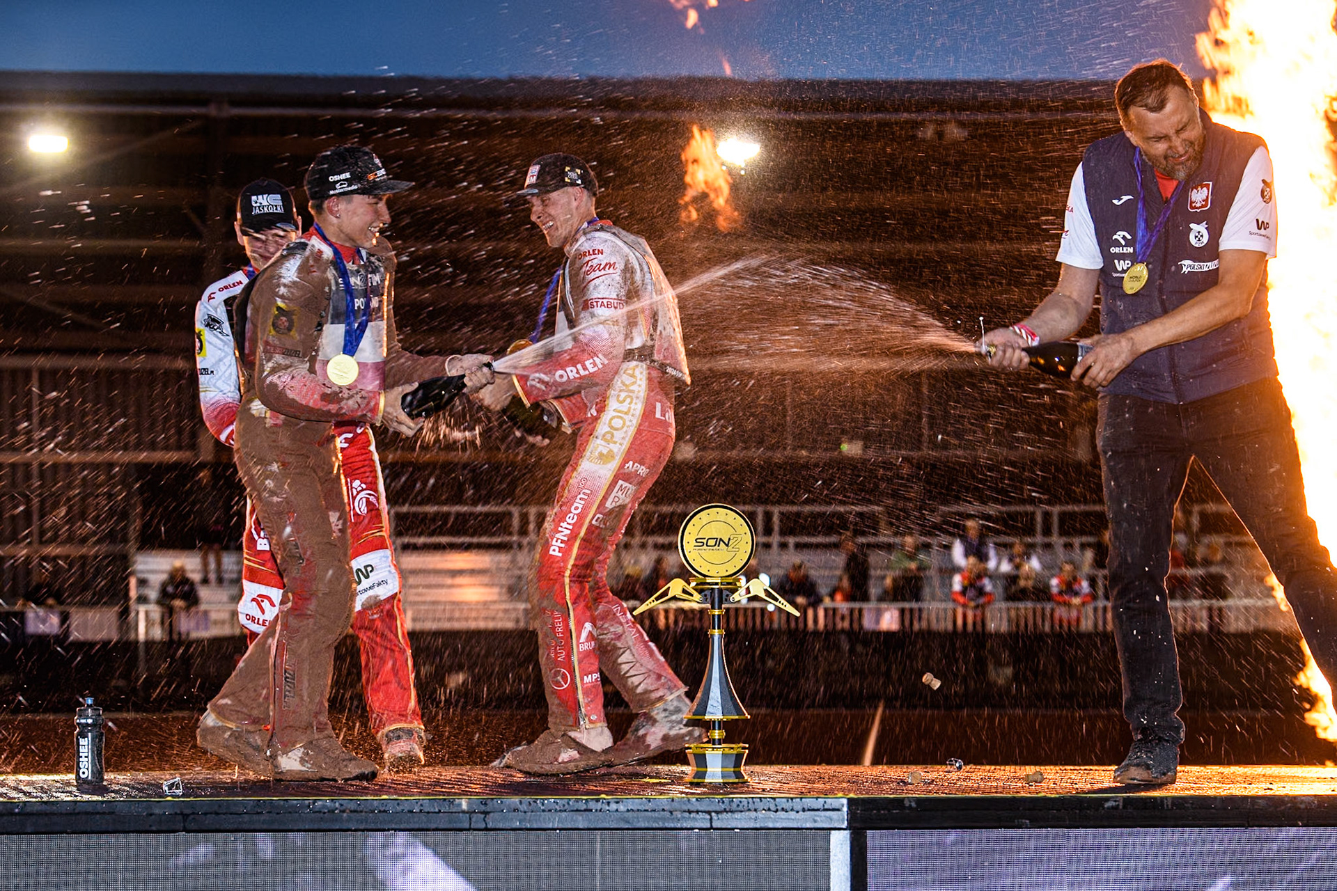 Poland celebrate with champagne during the Monster Energy FIM Speedway of Nations 2 (Under 21) Final at the National Speedway Stadium, Manchester on Friday 12th July 2024. (Photo: Ian Charles | MI News)