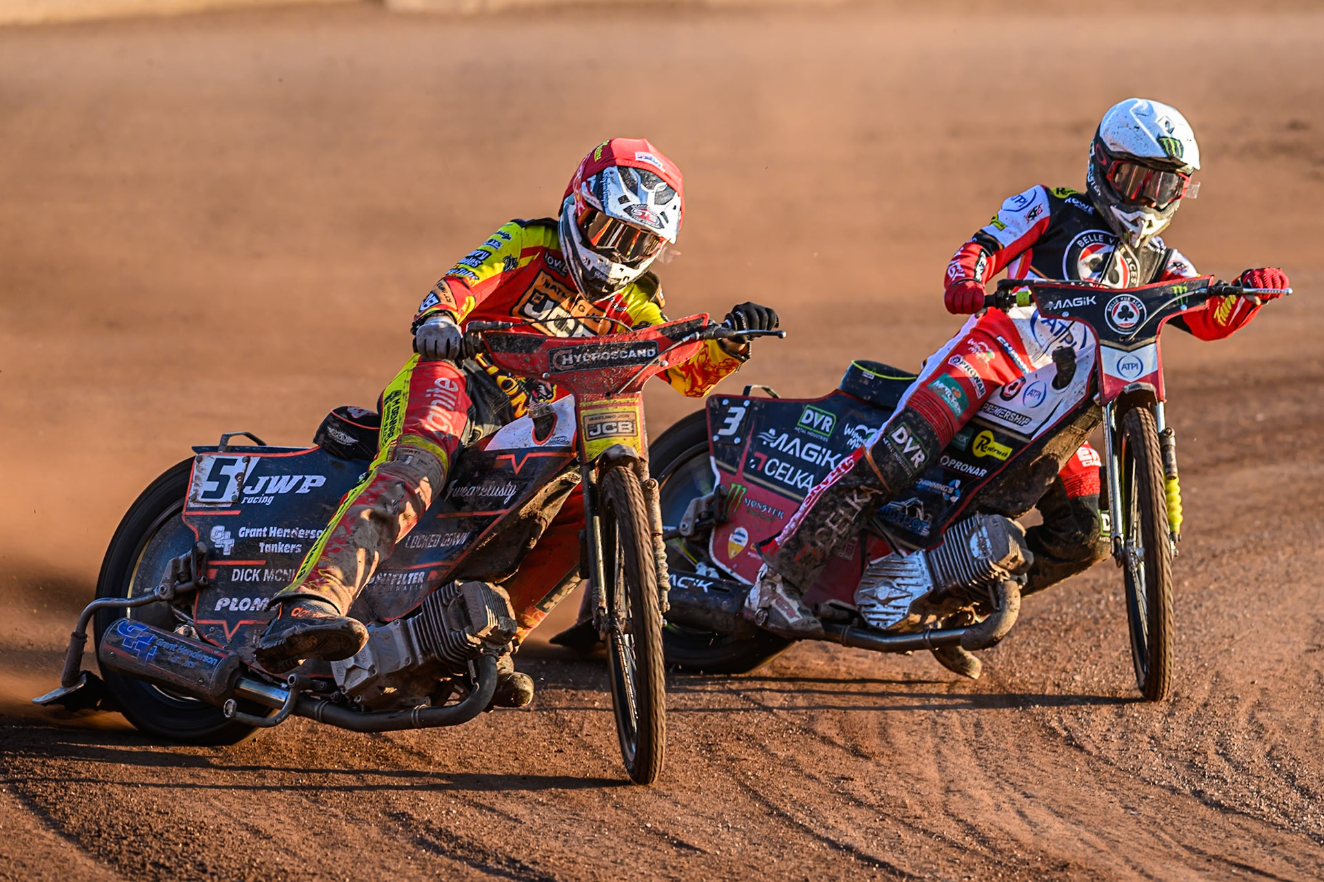 Leicester Lions' Sam Masters in Red leading Belle Vue Aces' Jaimon Lidsey in White during the Rowe Motor Oil Premiership match between Leicester Lions and Belle Vue Aces at the Hydroscand Arena, Leicester on Thursday 19th June 2025. (Photo: Ian Charles | MI News)
