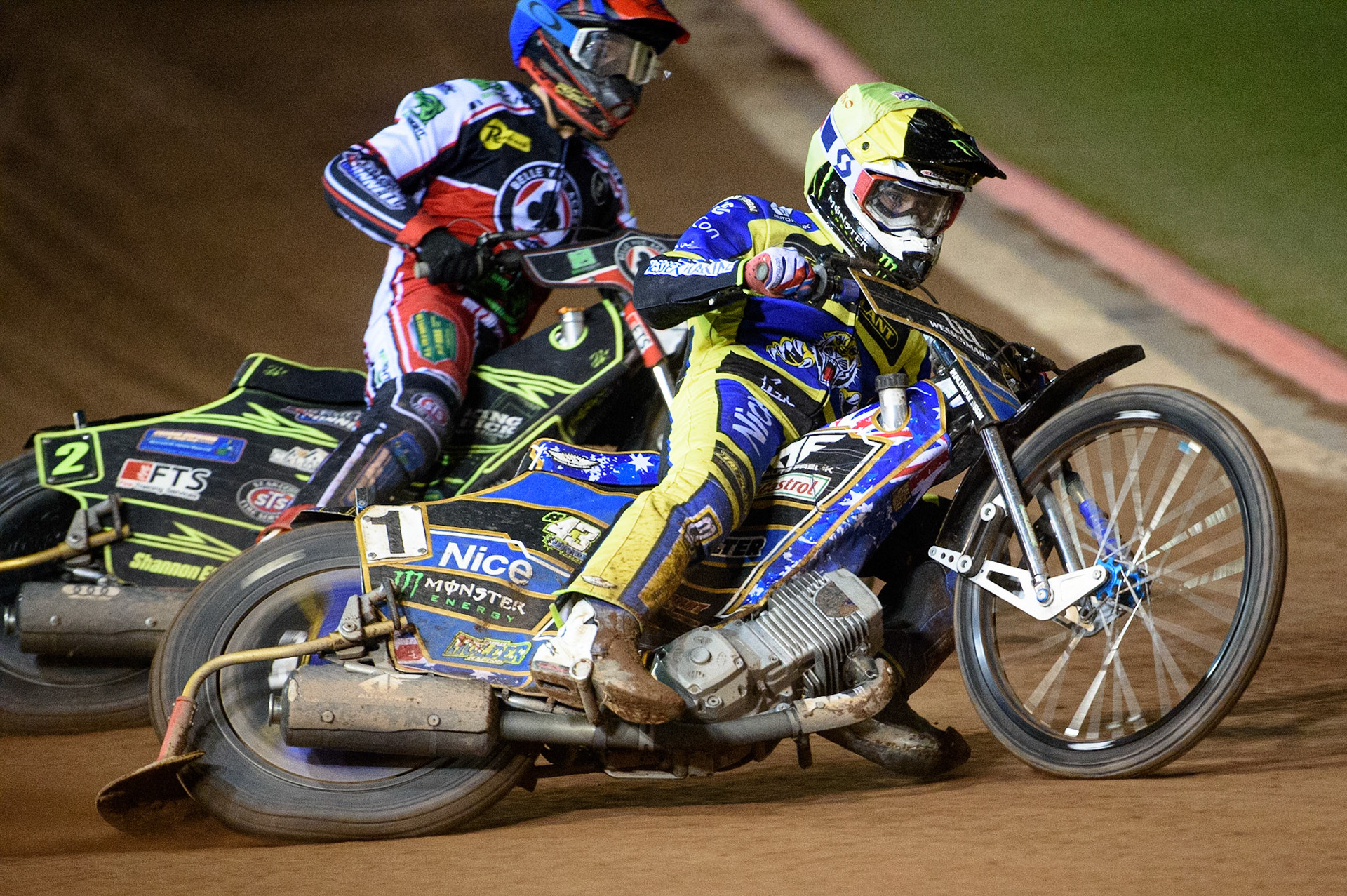 MANCHESTER, UK. SEPT 6TH  Jack Holder  (Yellow) tries to hold up Jye Etheridge  (Blue) during the SGB Premiership match between Belle Vue Aces and Sheffield Tigers at the National Speedway Stadium, Manchester on Monday 6th September 2021. (Credit: Ian Charles | MI News)
