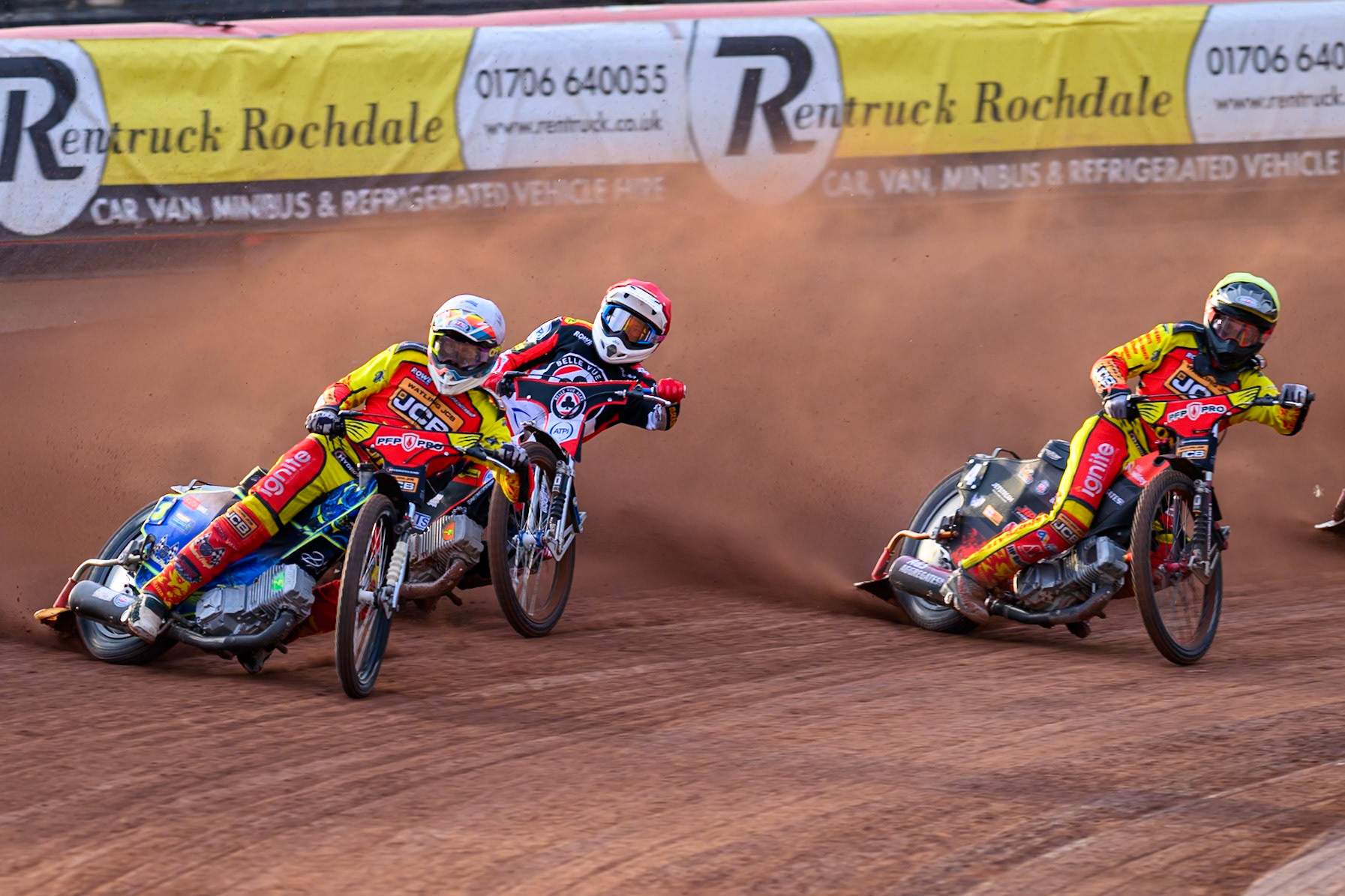 Nick Morris of Leicester Lions in White  leading Peter Kildemand of Belle Vue Aces in Red and Dan Thompson of Leicester Lions in Yellow during the Rowe Motor Oil Premiership match between Belle Vue Aces and Leicester Lions at the National Speedway Stadium, Manchester on Monday 3rd August 2026. (Photo: Ian Charles | MI News)