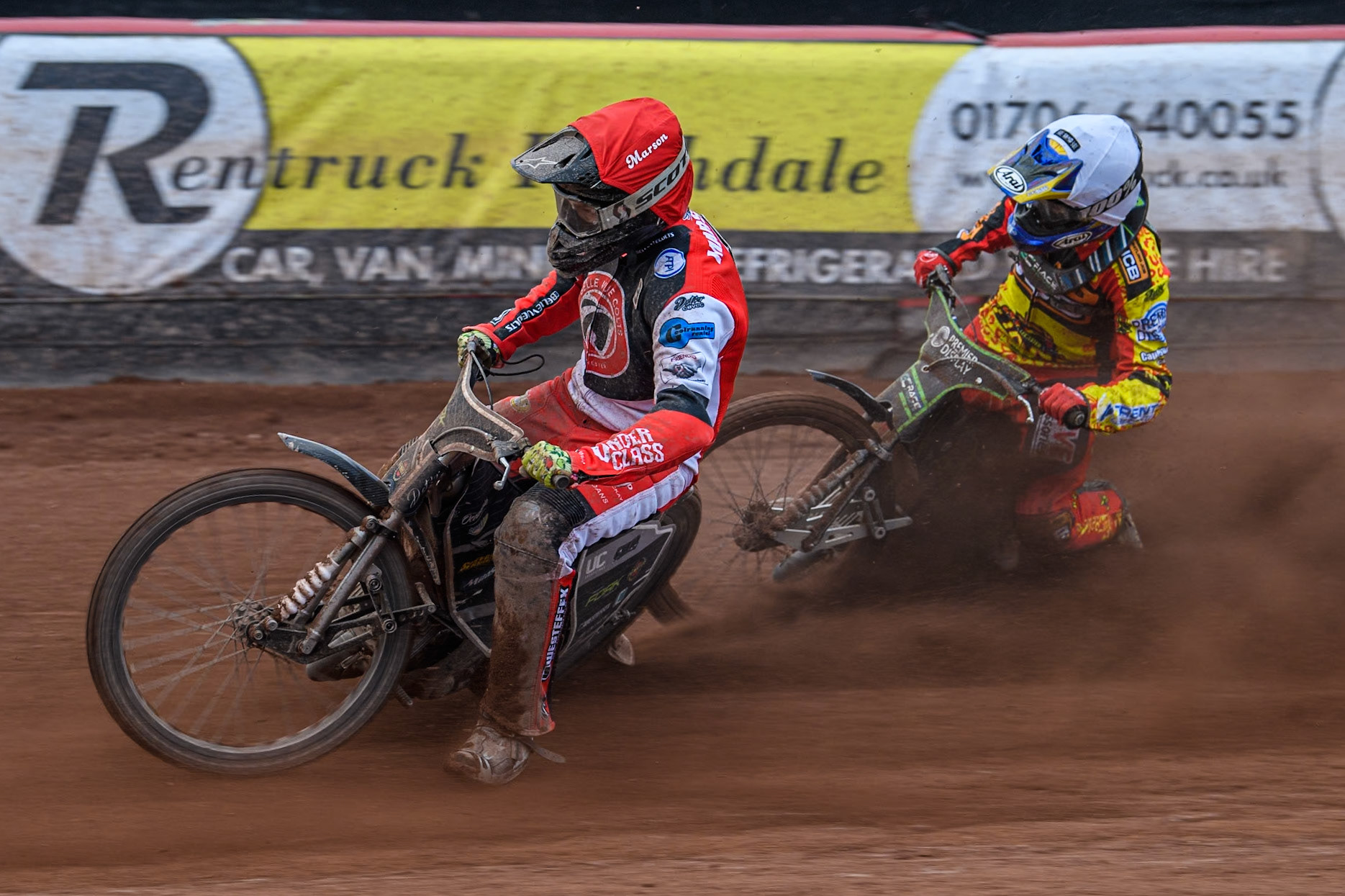 Belle Vue Colts' Matt Marson (Red) leads  Leicester Lion Cubs' Tom Spencer (White) during the WSRA National Development League match between Belle Vue Colts and Leicester Lion Cubs at the National Speedway Stadium, Manchester on Friday 29th March 2024. (Photo: Ian Charles | MI News)