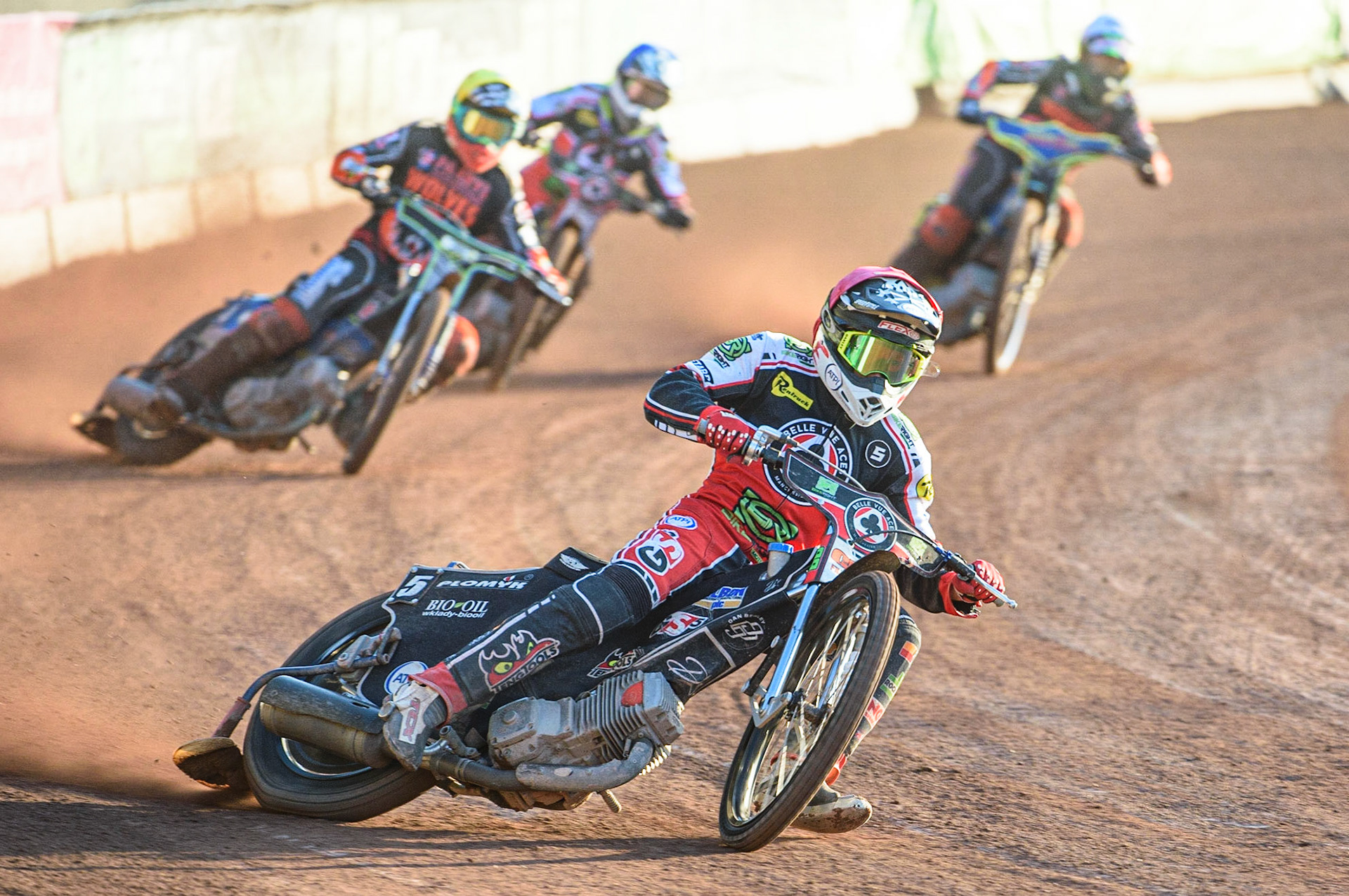 MANCHESTER, UK. JULY 15TH   Dan Bewley  (Red) leads Ryan Douglas (Yellow), Nick Morris  (White) and Tom Brennan  (Blue) during the SGB Premiership match between Belle Vue Aces and Wolverhampton Wolves at the National Speedway Stadium, Manchester on Thursday 15th July 2021. (Credit: Ian Charles | MI News)
